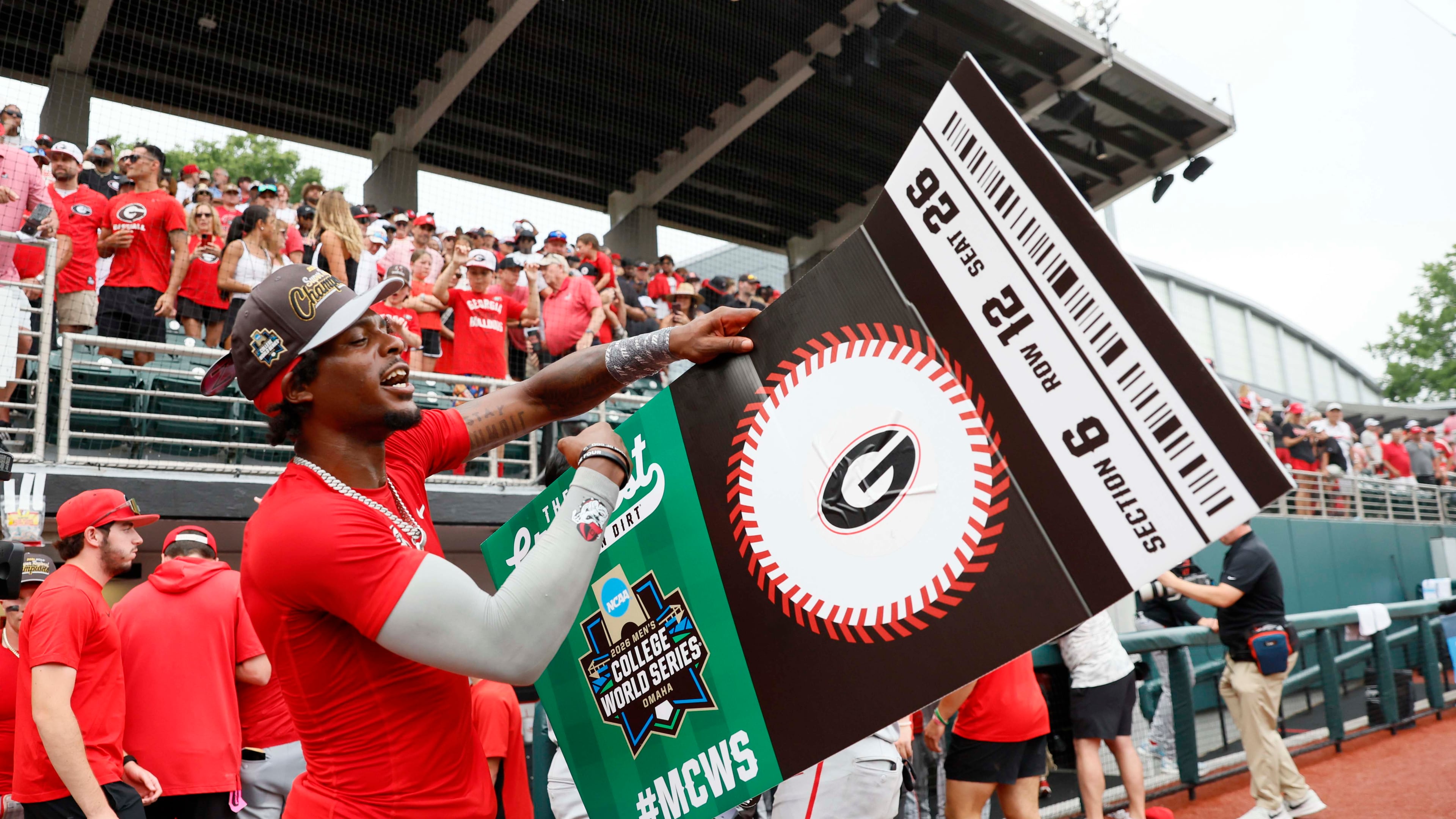 Georgia Bulldogs infielder Tre Phelps (1) reacts as he holds the winning ticket to Omaha College World Series after winning the NCAA Super Regional by defeating the Mississippi State Bulldogs 11-9 in extra innings at Foley Field on Sunday, June 7, 2026, in Athens.
Miguel Martinez/AJC)