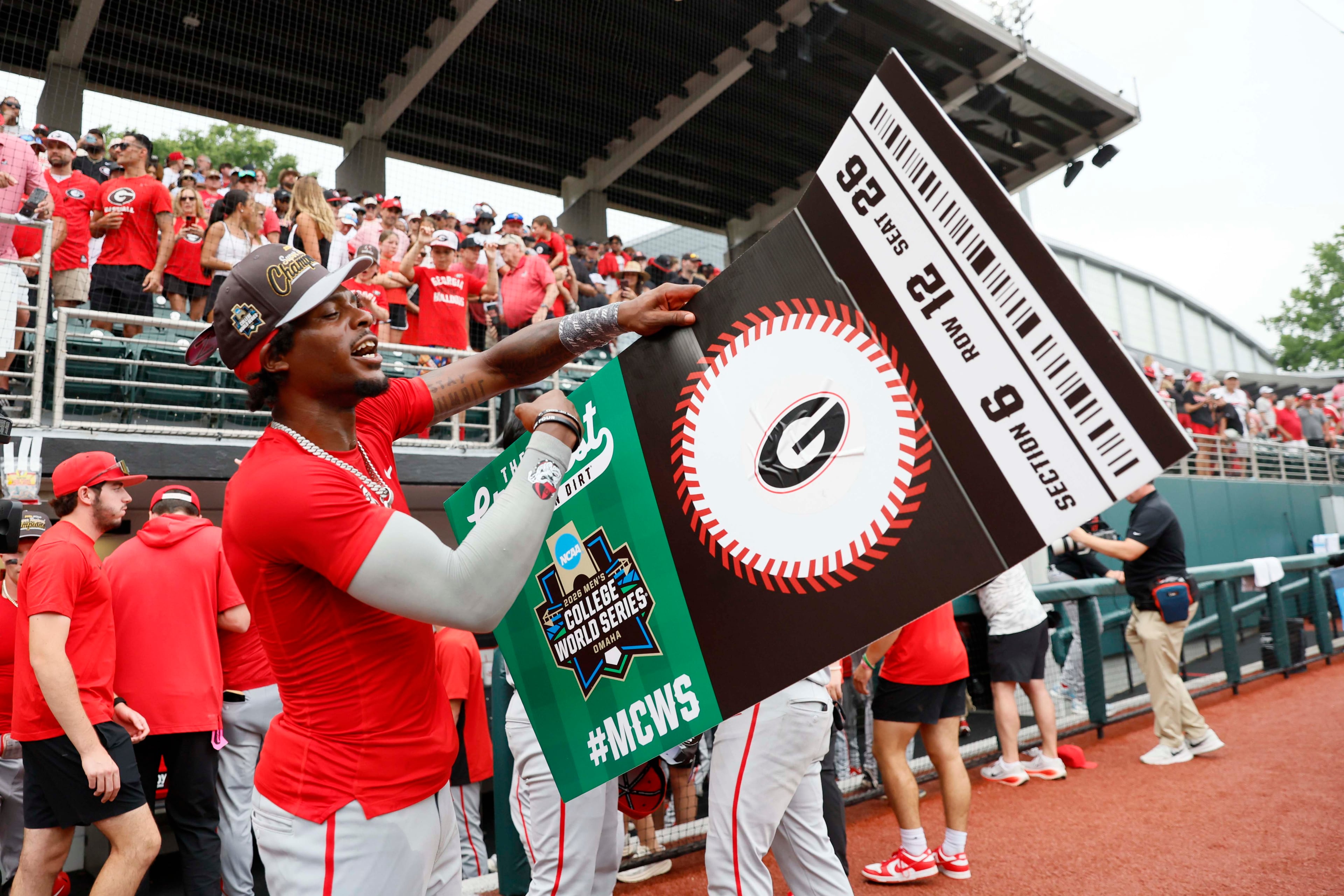 Georgia Bulldogs infielder Tre Phelps (1) reacts as he holds the winning ticket to Omaha College World Series after winning the NCAA Super Regional by defeating the Mississippi State Bulldogs 11-9 in extra innings at Foley Field on Sunday, June 7, 2026, in Athens.
Miguel Martinez/AJC)