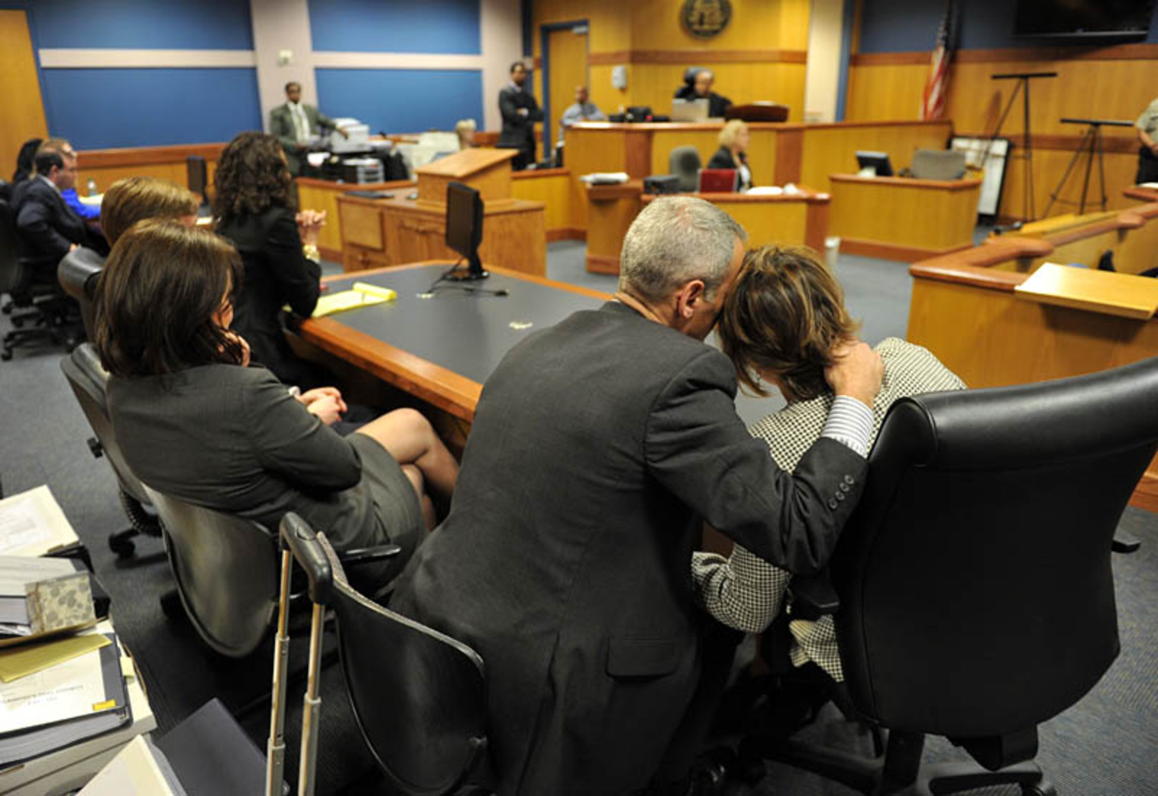 Stacey Kalberman and her husband Neil react after winning a whistle blower suit against the state ethics commission. The former state ethics commission executive director sued after she claimed she was forced from her position after investigating Gov. Nathan Deal's campaign.