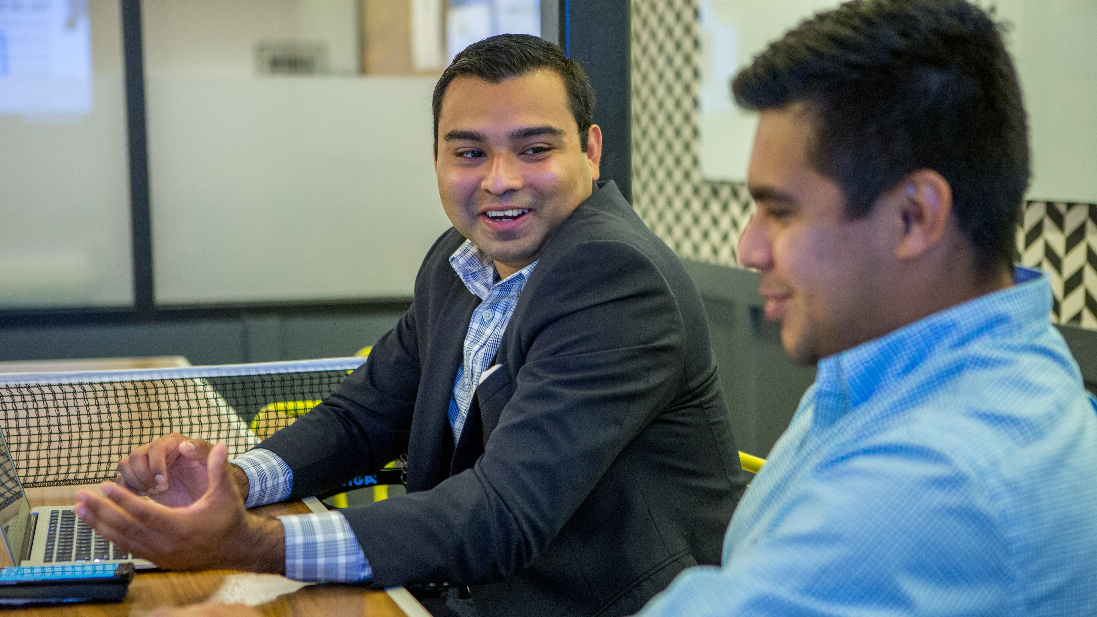 Jaime Rangel (left) works as an organizing intern with supervisor Sam Aguilar at FWD.us in Atlanta on September 18th, 2017. (Photo by Phil Skinner)