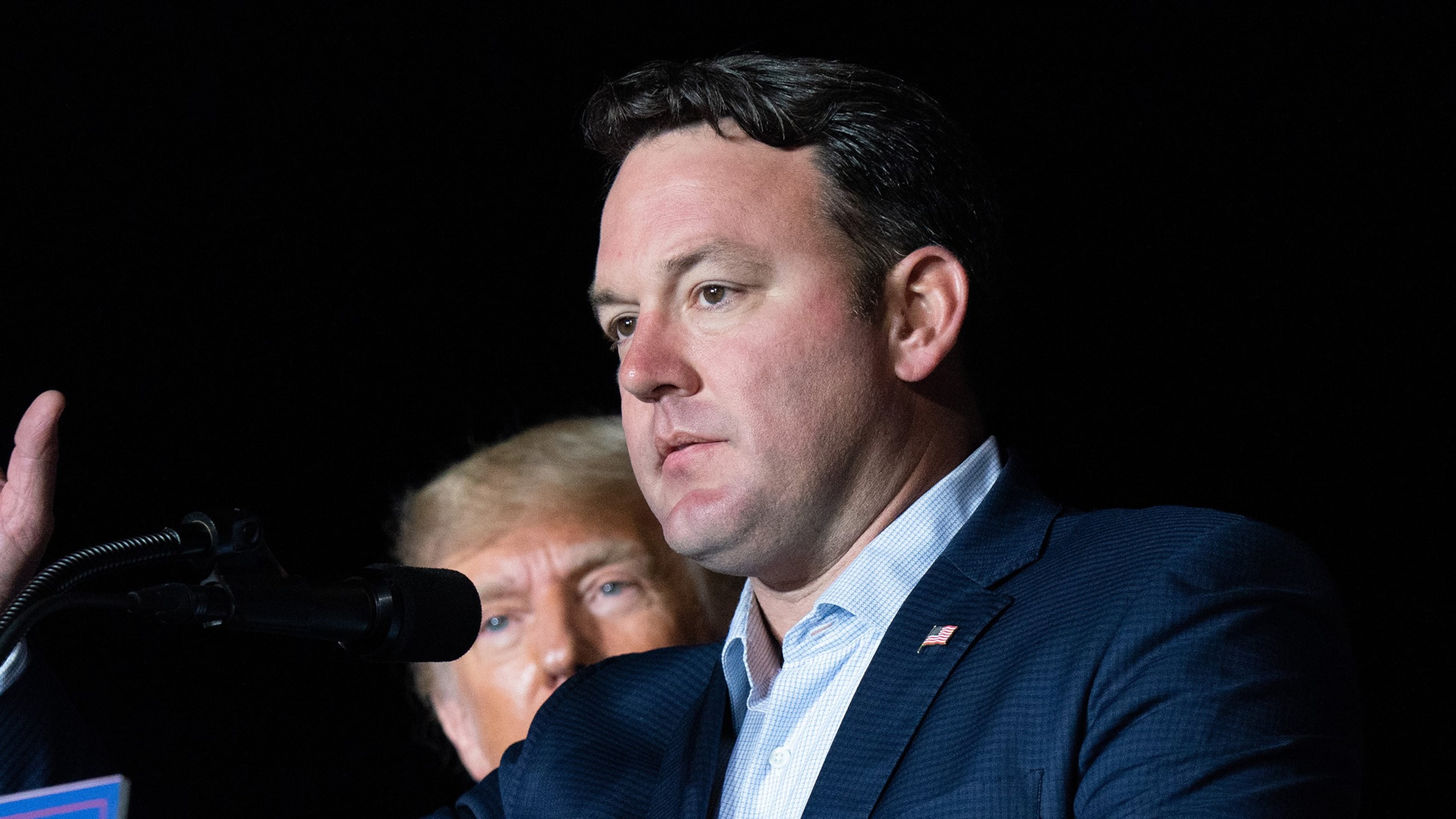 Georgia lieutenant gubernatorial candidate State Sen. Burt Jones (R-Georgia) speaks at a rally as former U.S. President Donald Trump watches on Sept. 25, 2021 in Perry, Georgia. (Sean Rayford/Getty Images/TNS)