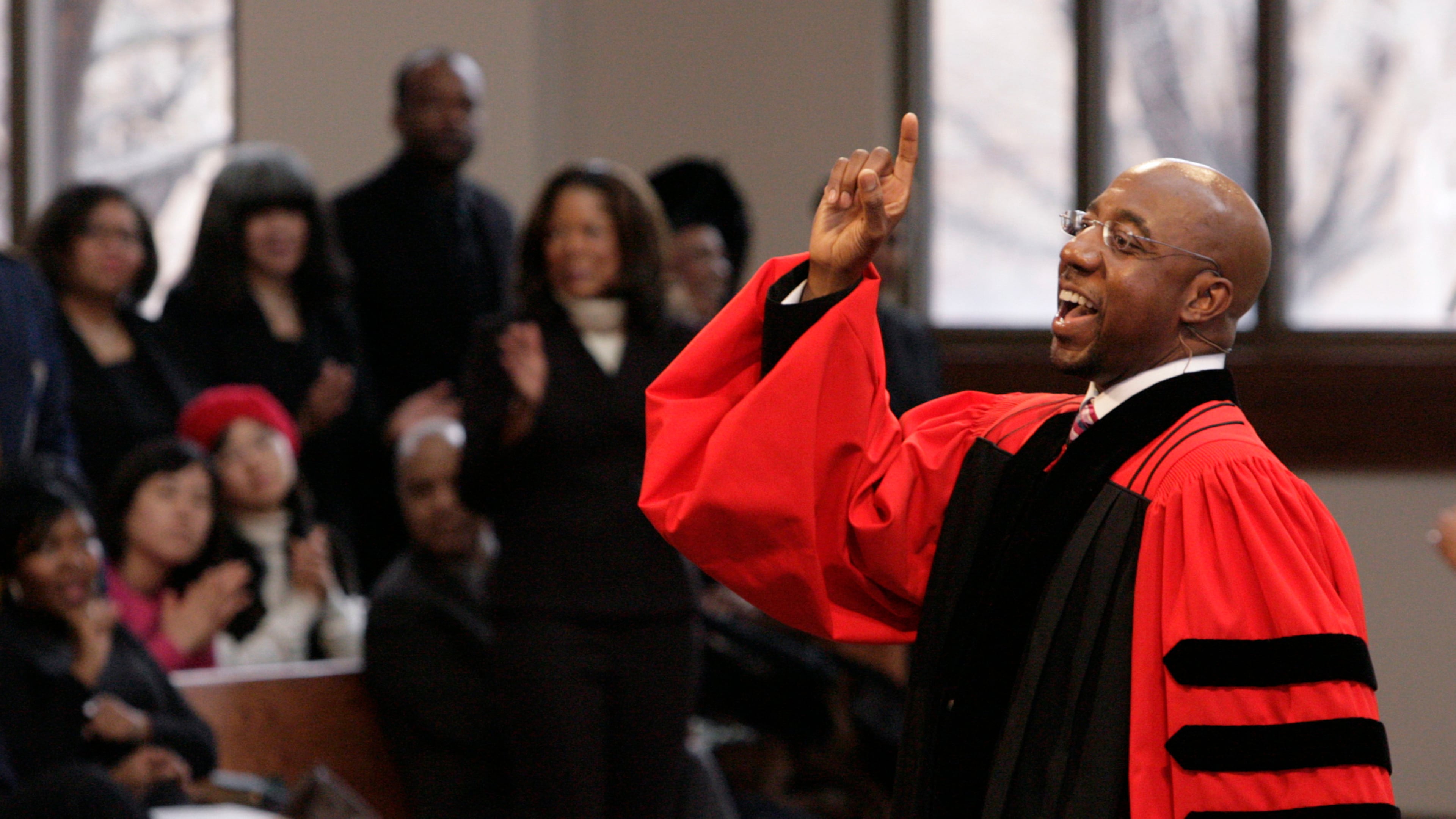 FILE - The Rev. Raphael Warnock delivers a sermon during a church service at Ebenezer Baptist Church in Atlanta on Sunday Jan. 18, 2009. (AP Photo/John Amis, File)