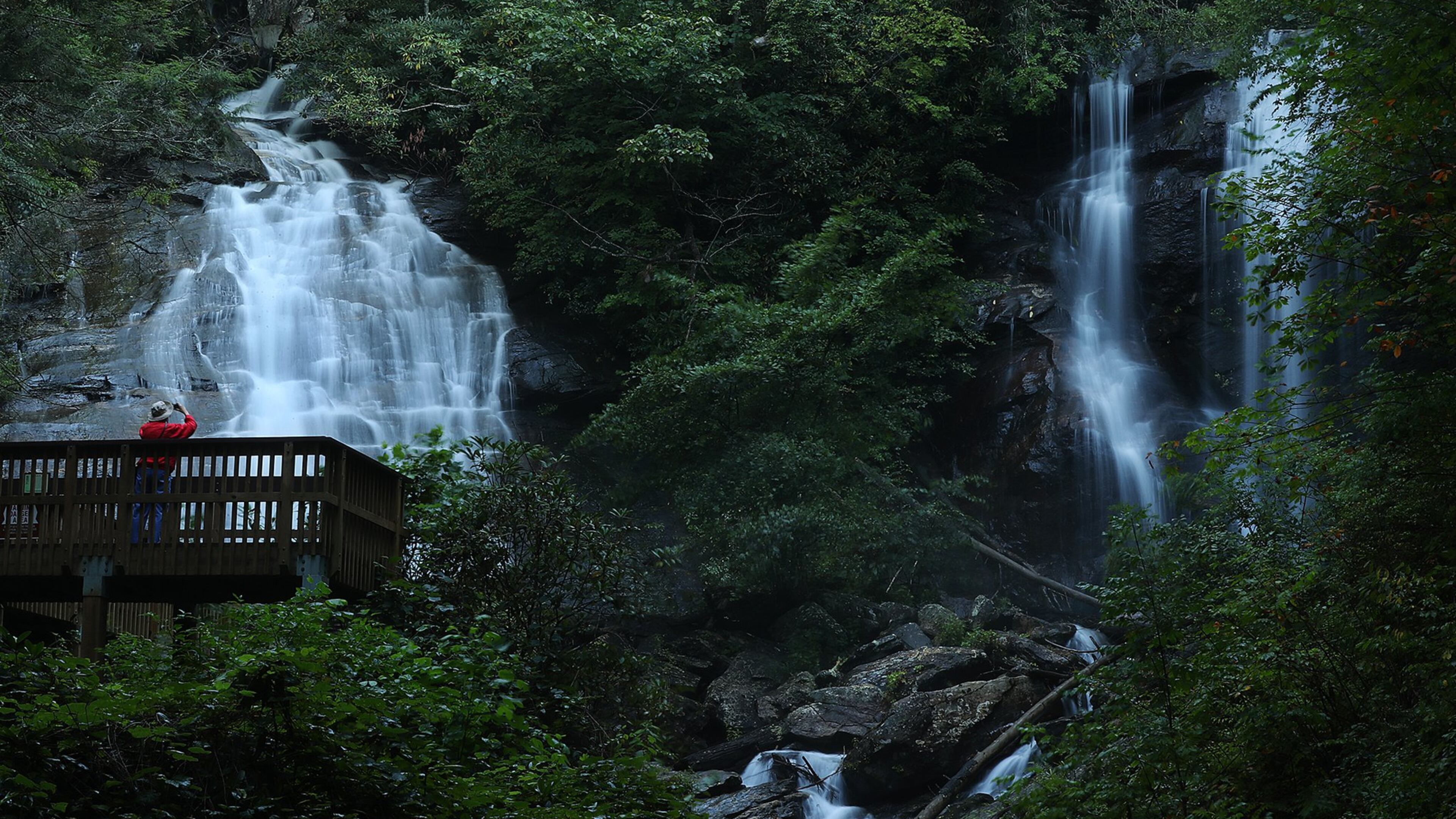 A visitor takes in spectacular Anna Ruby Falls in the heart of the Chattahoochee National Forest.