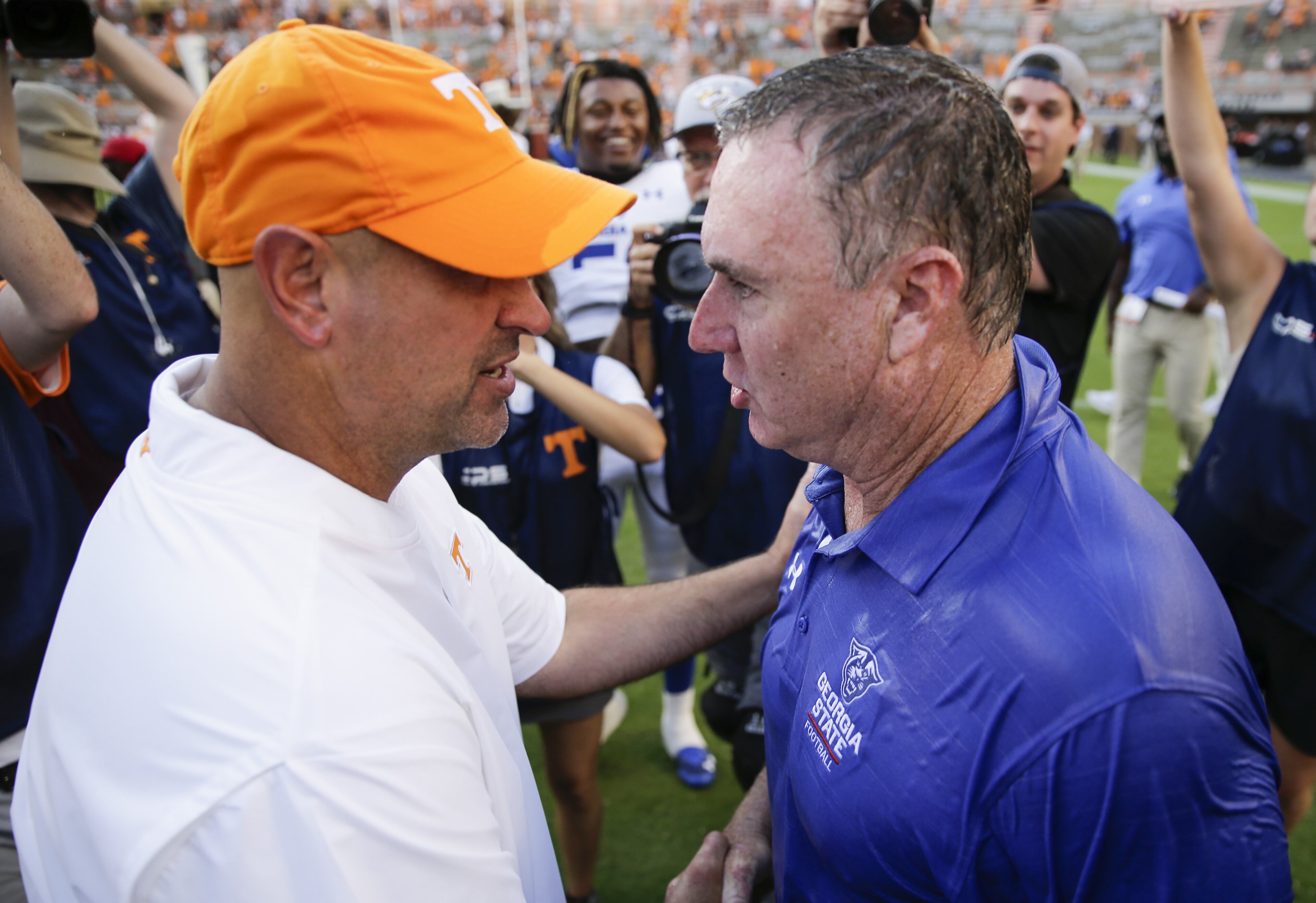 KNOXVILLE, TENNESSEE - AUGUST 31: Head coach Jeremy Pruitt of the Tennessee Volunteers shakes hands with head coach Shawn Elliott of the Georgia State Panthers after the Panthers win in an upset in the season opener at Neyland Stadium on August 31, 2019 in Knoxville, Tennessee. (Photo by Silas Walker/Getty Images)