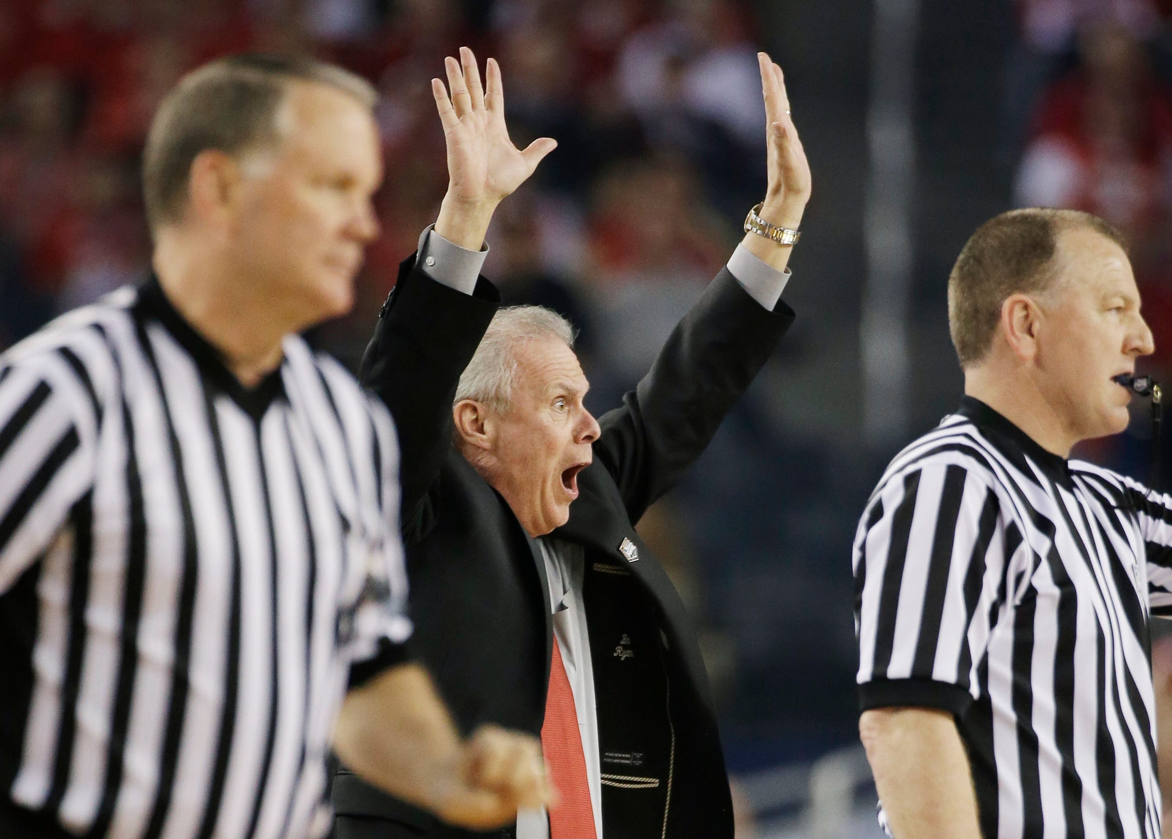 Wisconsin head coach Bo Ryan reacts to action against Kentucky during the first half of the NCAA Final Four tournament college basketball semifinal game Saturday, April 5, 2014, in Arlington, Texas. (AP Photo/David J. Phillip)