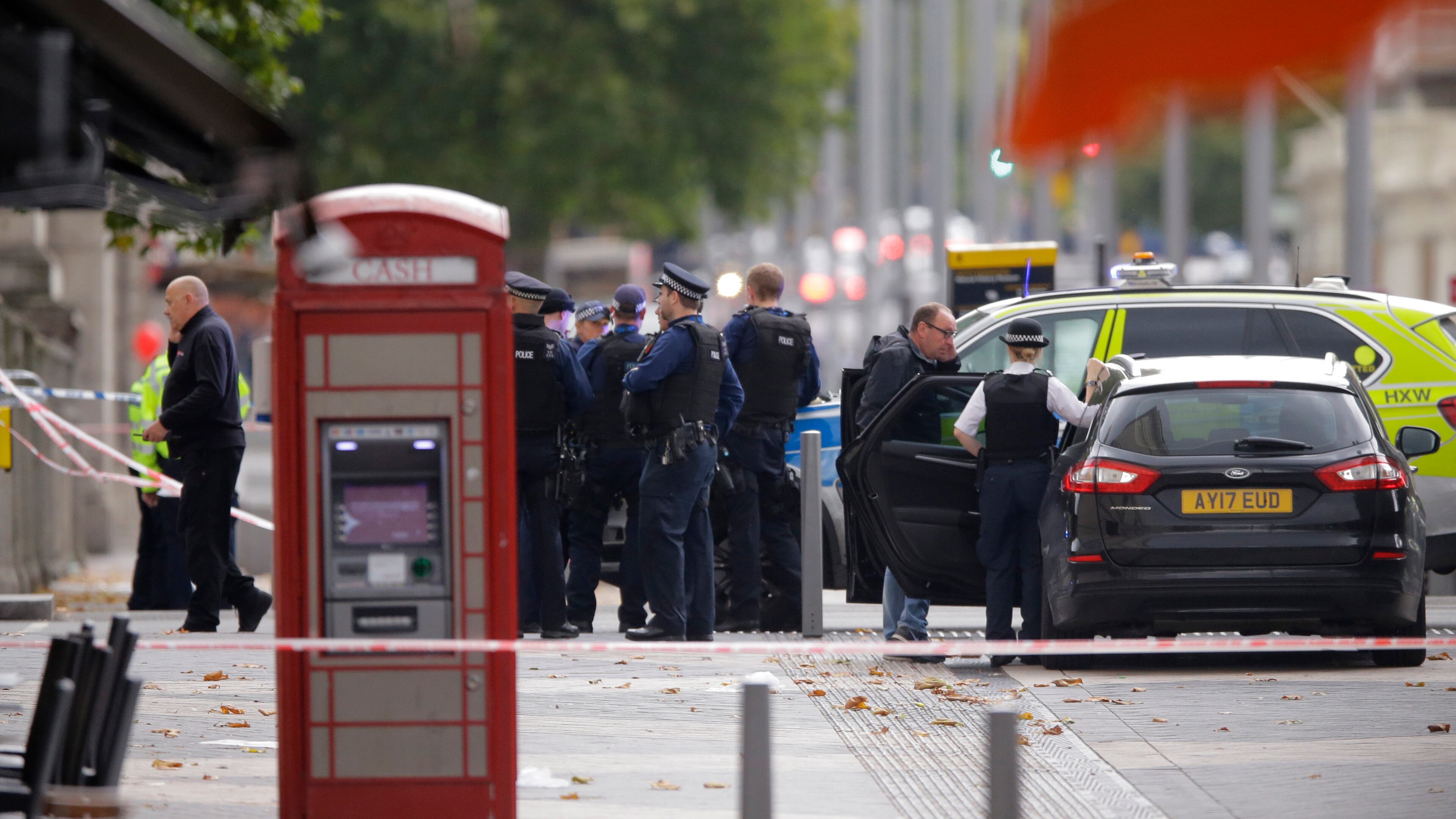 British police investigate the scene of an incident in central London on Saturday.