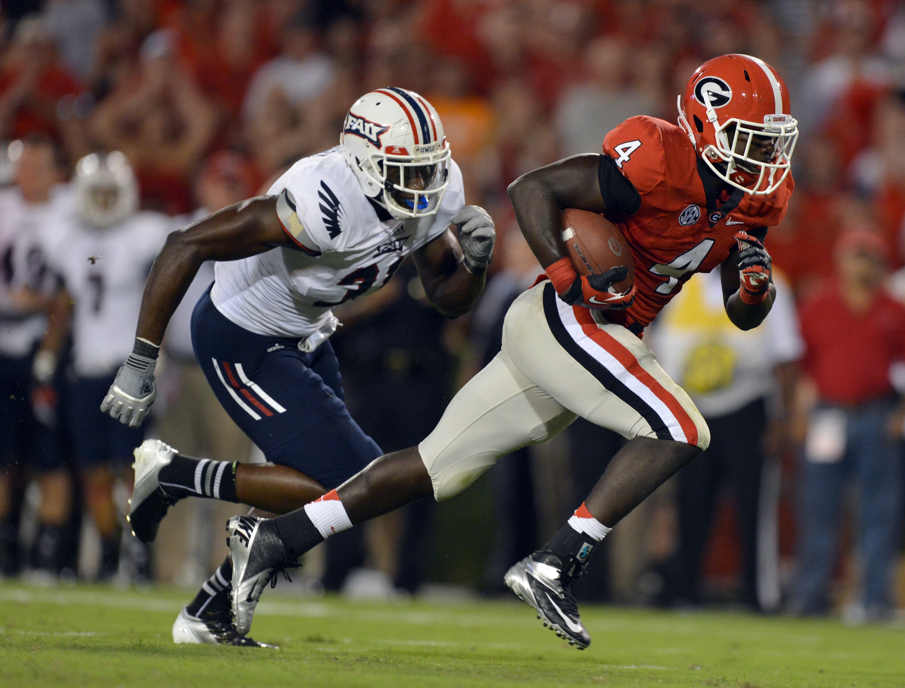 Georgia Bulldogs running back Keith Marshall rushes for 17 yards against Florida Atlantic.