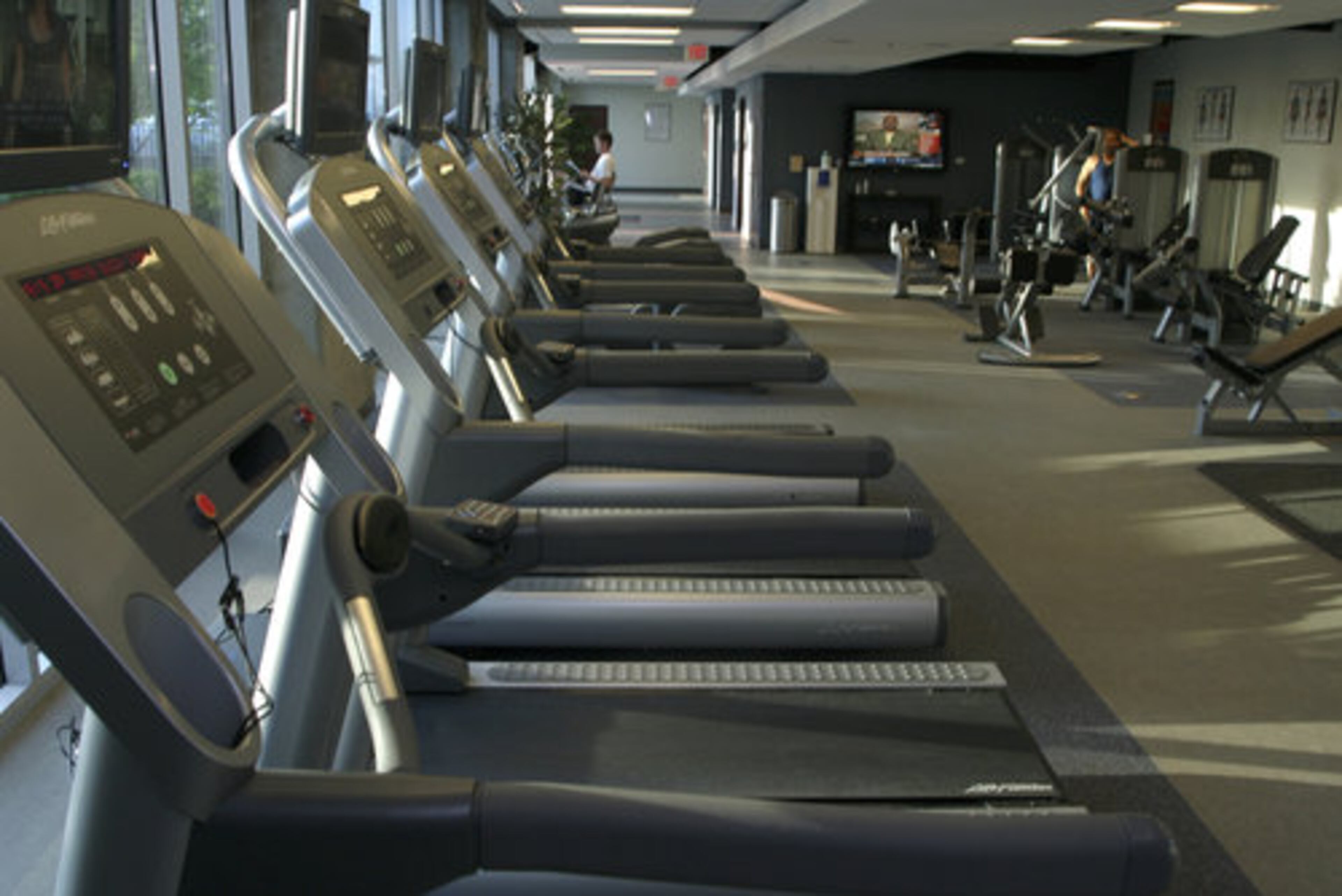 The fitness room for the residences at Twelve Centennial Park is spacious and meticulous with a southern-facing view of downtown Atlanta.