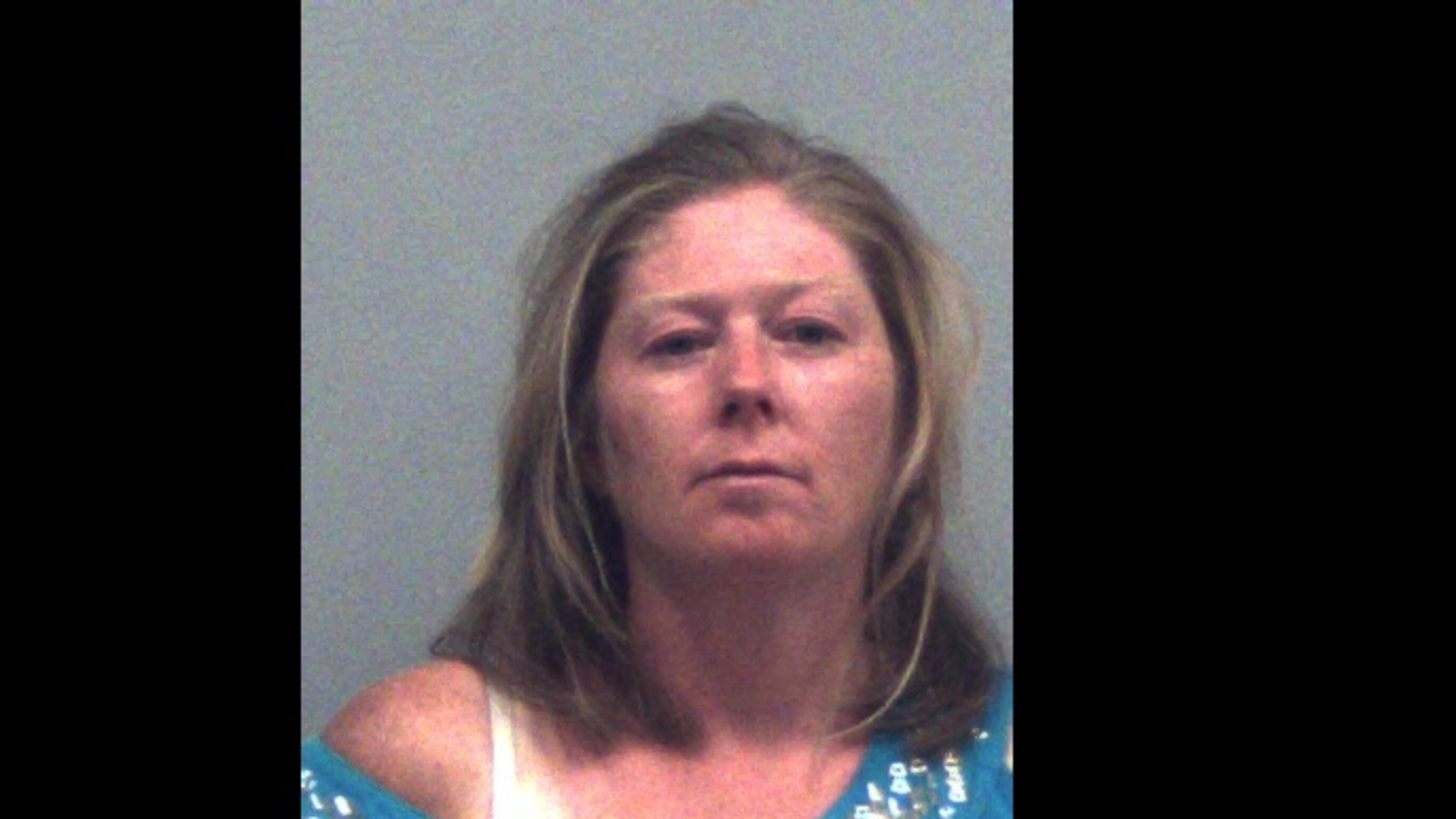 Joy Renee Carter has been charged with aggravated assault and criminal trespass after her boyfriend told police she tried to hit him with a pickax.