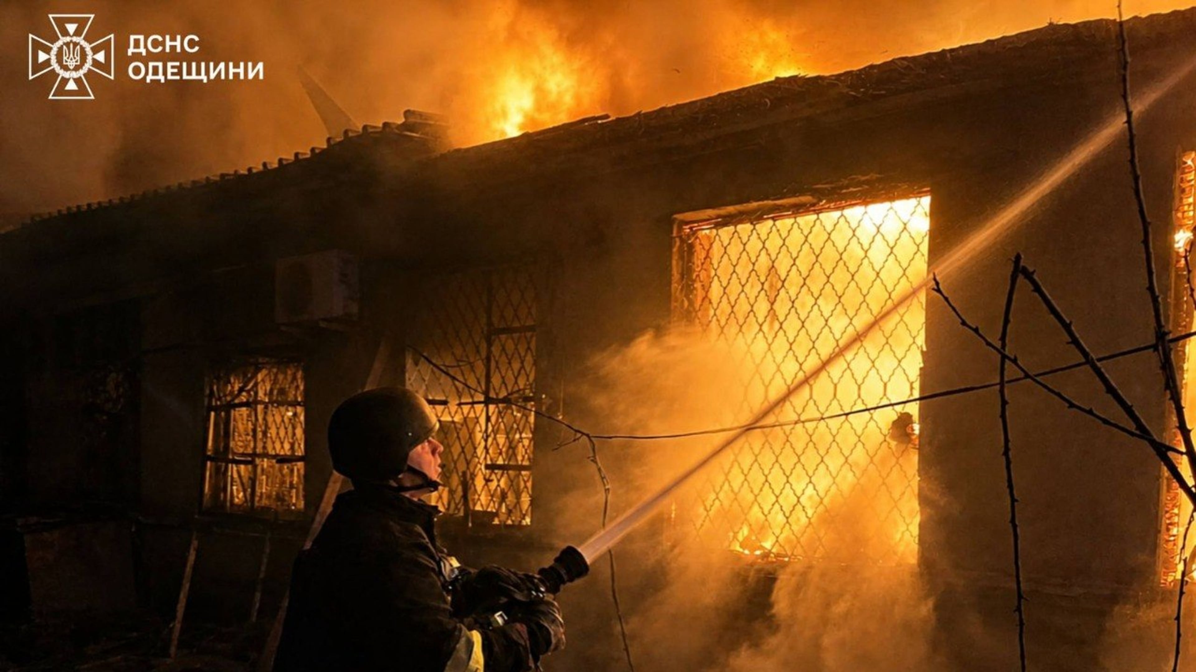 In this photo provided by the Ukrainian Emergency Service, firefighters put out a fire a building following a Russian drone attack in Odesa region, Ukraine, Saturday, May 2, 2026. (Ukrainian Emergency Service via AP)