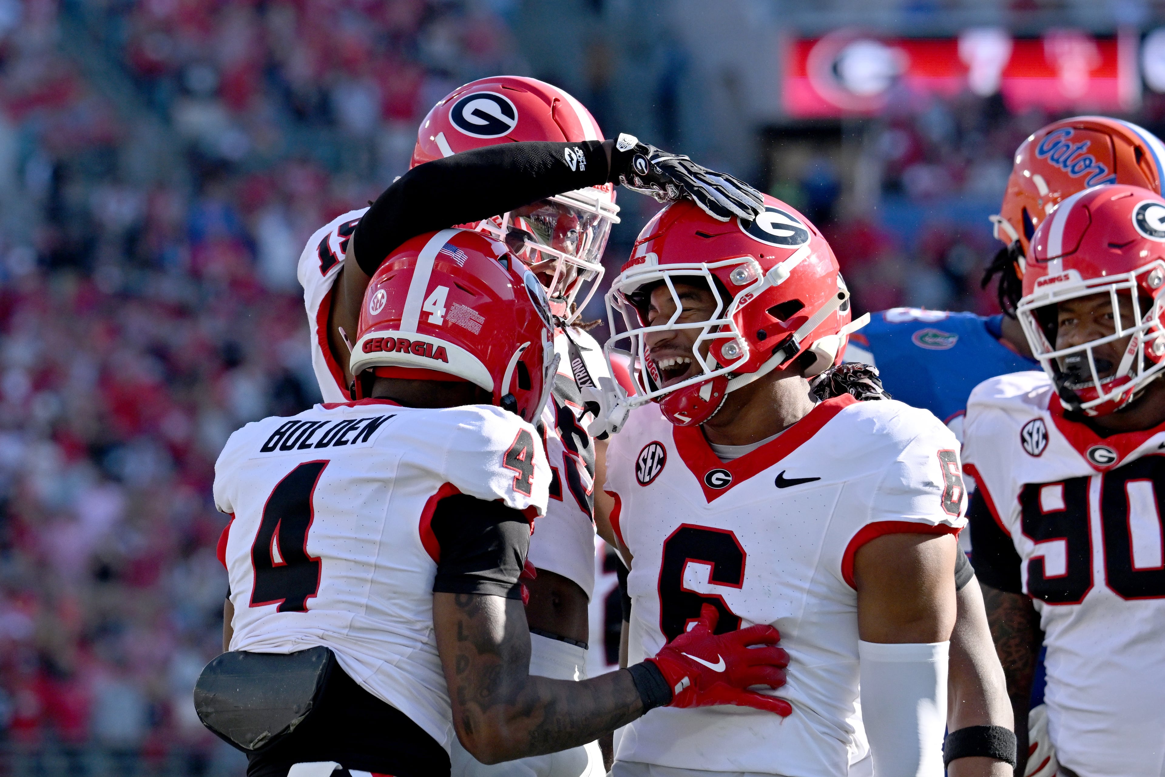 Georgia defensive back Kj Bolden (4) and Georgia defensive back Daylen Everette (6) celebrate during the first half in an NCAA football game, Saturday, November 1, 2025, Jacksonville, Fla. (Hyosub Shin / AJC)