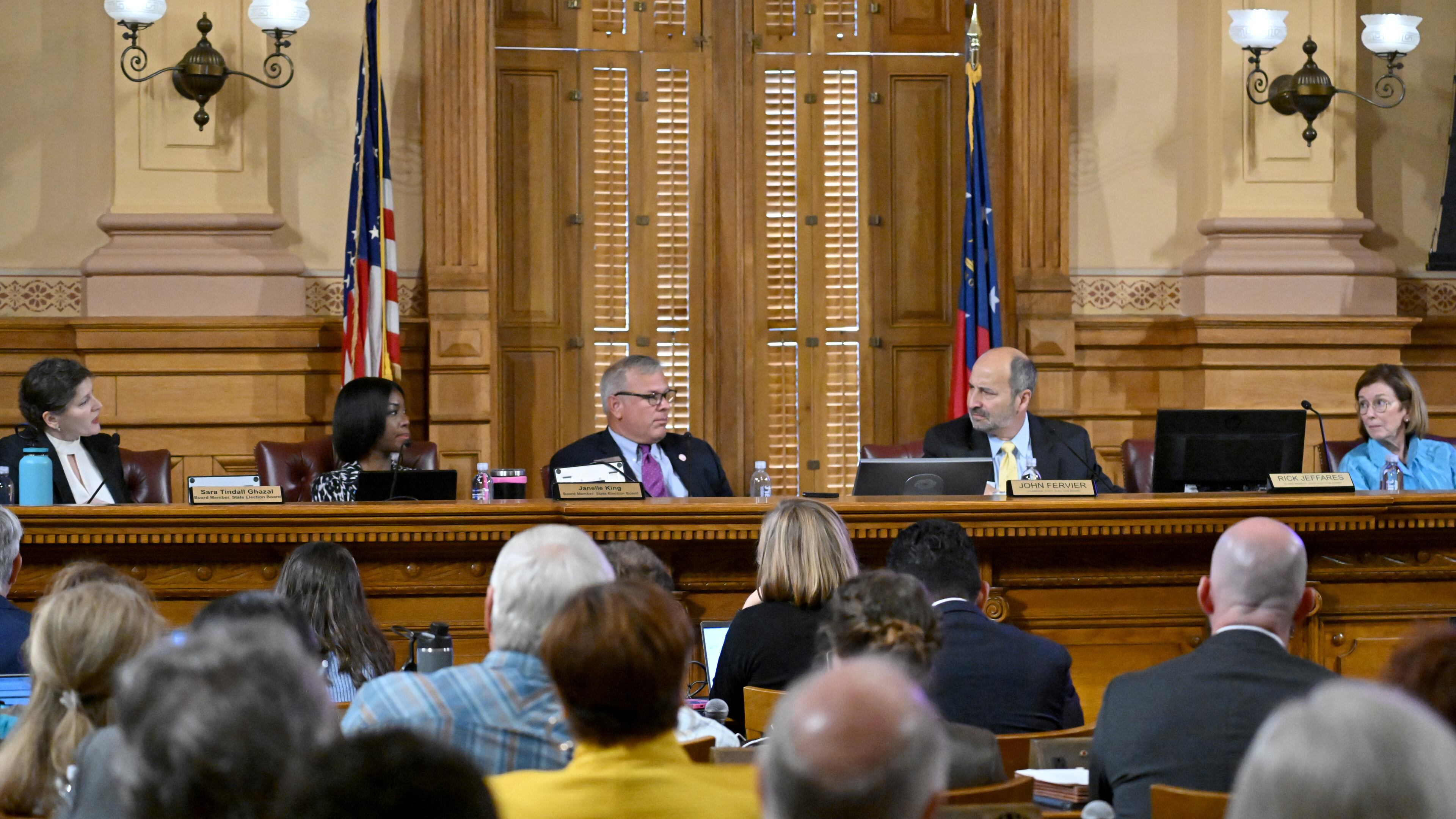 State Election Board Members (from left) Sara Tindall Ghazal, Janelle King, Mike Coan (executive director), John Fervier (chairman) and Janice Johnston are pictured at a meeting at the Capitol in Atlanta on Oct. 8, 2024. (Hyosub Shin / AJC)