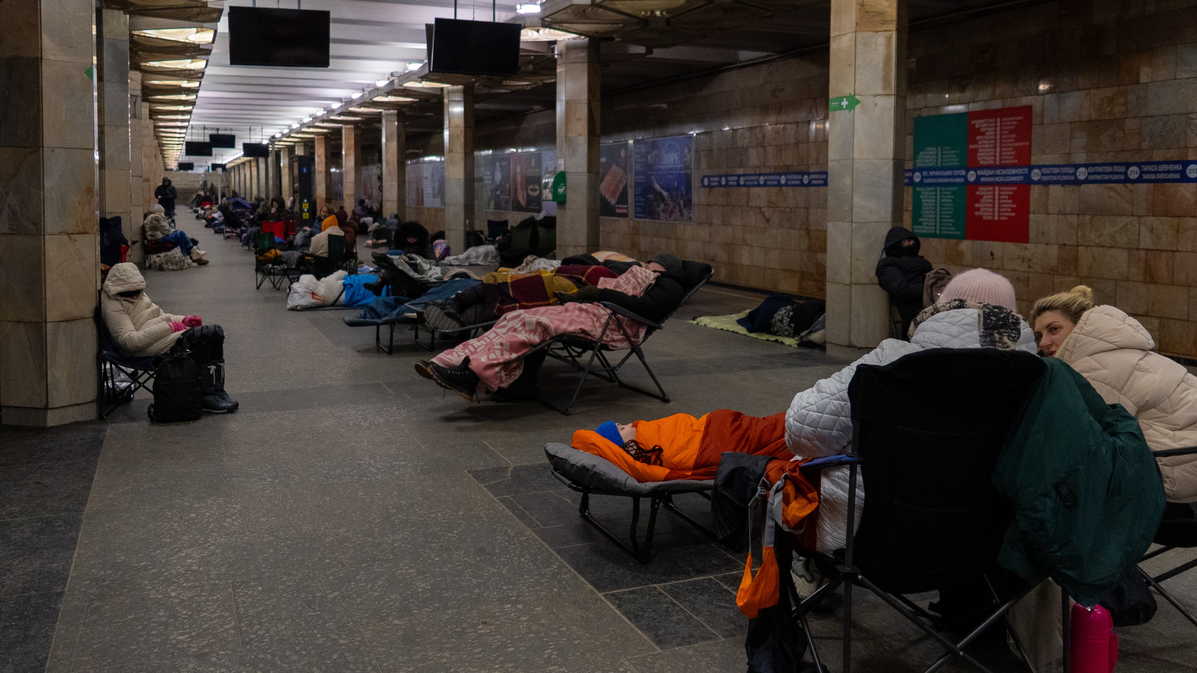 People take shelter in a metro station, being used as a bomb shelter, during a Russian drones attack in Kyiv, Ukraine, Tuesday, Feb. 3, 2026. (AP Photo/Alex Babenko)