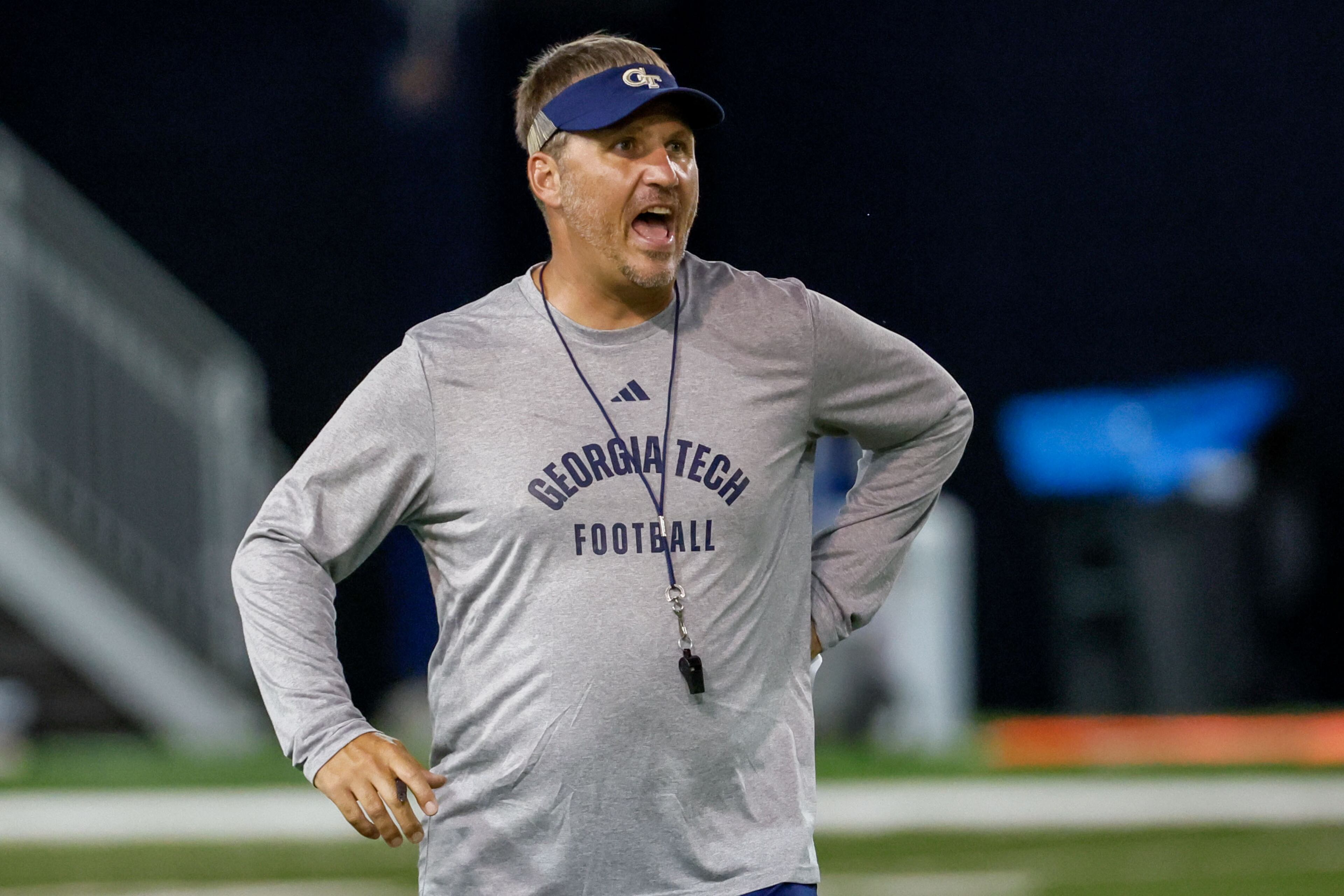 Offensive Coordinator Buster Faulkner yells directions during the second day of football practice at the Brock Indoor Practice Facility on Thursday, July 25, 2024, in Atlanta.
(Miguel Martinez / AJC)