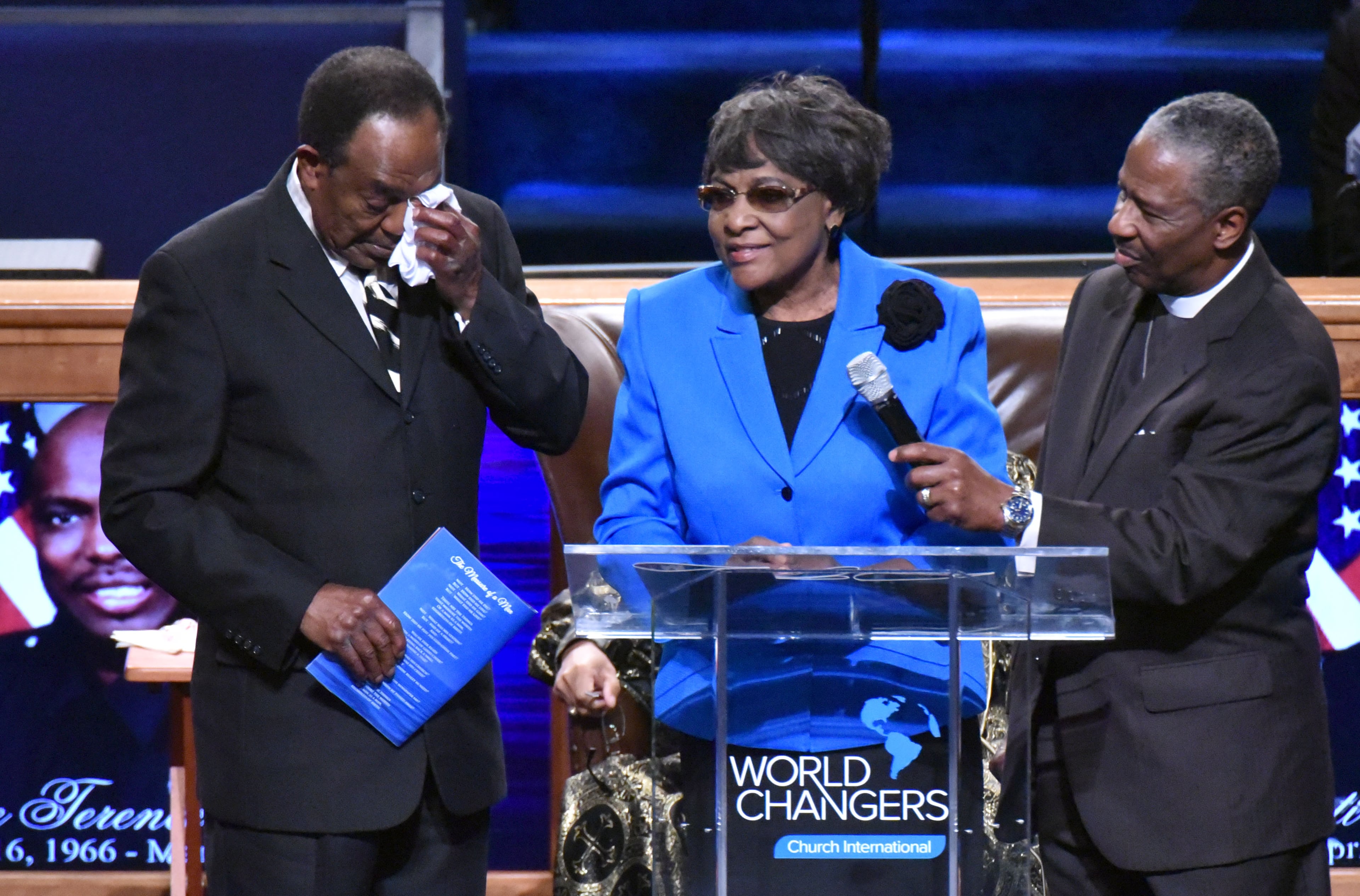 Bertha Green, mother of Fulton County Detective Terence Green, speaks as her husband Johnny Green reacts during a funeral service at World Changers International Church on Friday, March 13, 2015. Terence Avery Green, 48, was on duty March 4 when he was killed in what a Fulton police assistant chief called an ambush-style attack. HYOSUB SHIN / HSHIN@AJC.COM