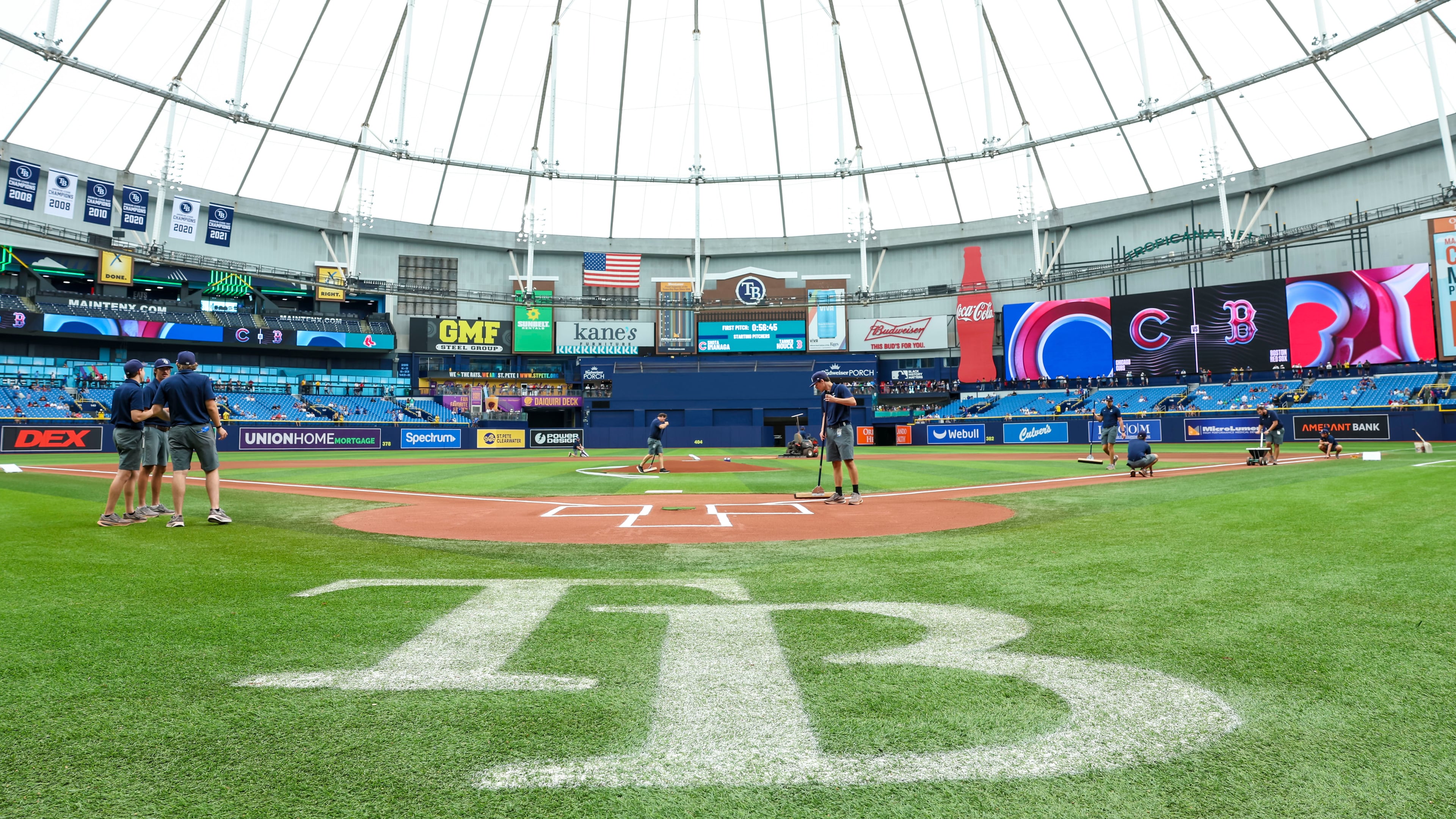 Crews prepare the field for a baseball game between the Chicago Cubs and the Boston Red Sox at Tropicana Field, Sunday, Sept. 27, 2026, in St. Petersburg, Fla. (AP Photo/Chris Urso)