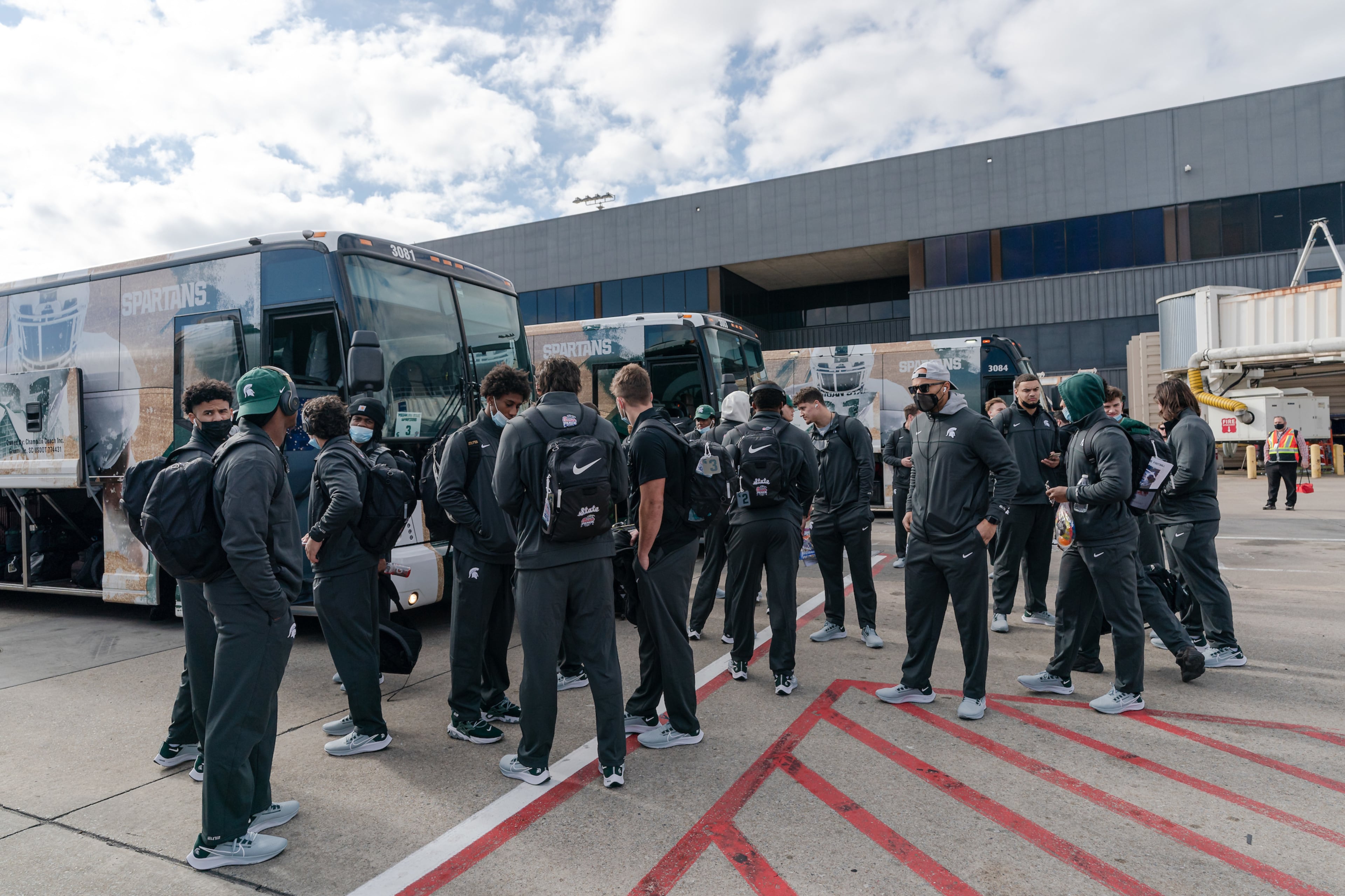 Michigan State arrives at Hartsfield-Jackson Atlanta International Airport for the Chick-fil-A Peach Bowl NCAA college football game Friday, Dec. 24, 2021, in Atlanta, Ga. Michigan State will face Pitt in the game on Dec.30, 2021. (Paul Abell via Abell Images for the Chick-fil-A Peach Bowl)