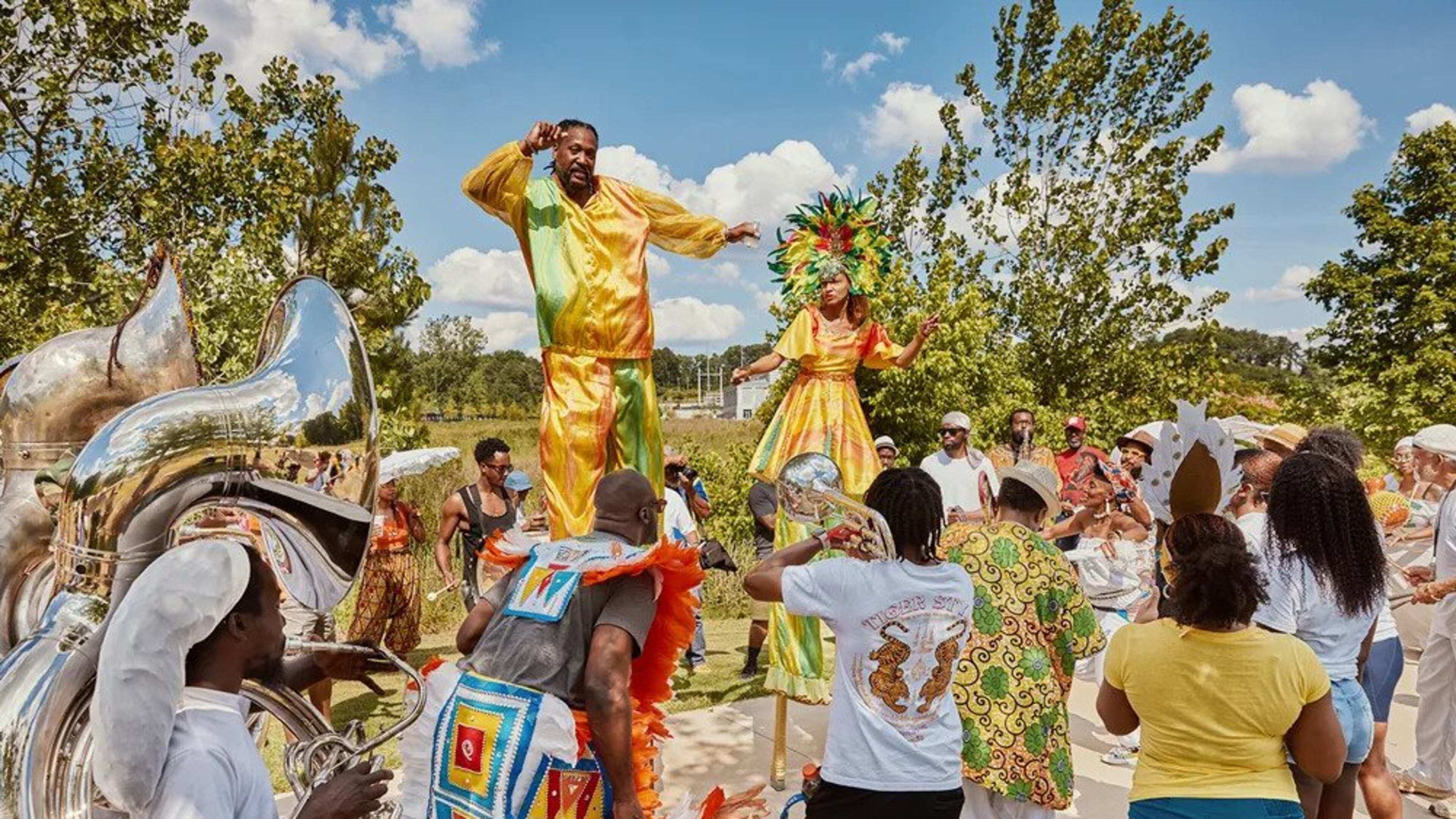 Part of Art on the Atlanta Beltline’s performance series, Mausiki Scales and the Common Ground Collective provided live music and entertainment with their No Tables, No Chairs parade through Westside Park. (Photo by Erin Sintos)