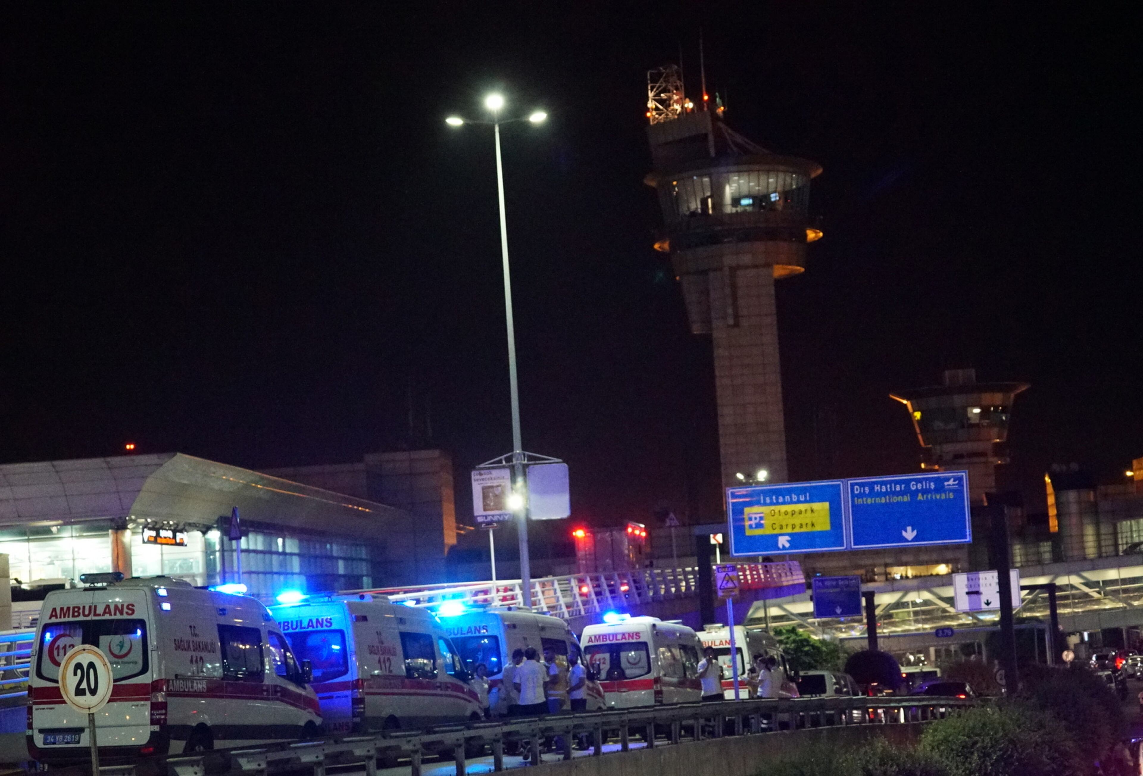 Ambulances wait outside Turkey's largest airport, Istanbul Ataturk, on June 28, 2016 in Istanbul, Turkey. Three suicide bombers opened fire before blowing themselves up at the entrance to the main international airport in Istanbul, killing at least 28 people and wounding at least 60 people, according to Istanbul governor Vasip Sahin. (Photo by Mehmet Ali Poyraz/Getty Images)