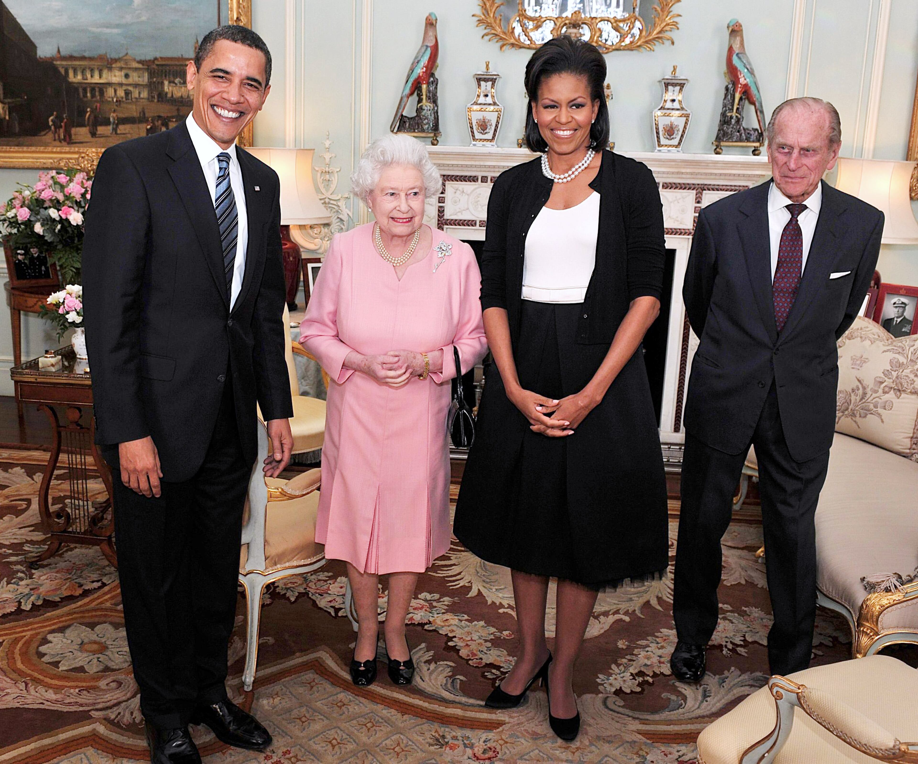 US President Barack Obama and his wife Michelle Obama pose for photographs with Queen Elizabeth II and Prince Philip, Duke of Edinburgh during an audience at Buckingham Palace on April 1, 2009 in London, England. (Photo by John Stillwell - WPA Pool/Getty Images)