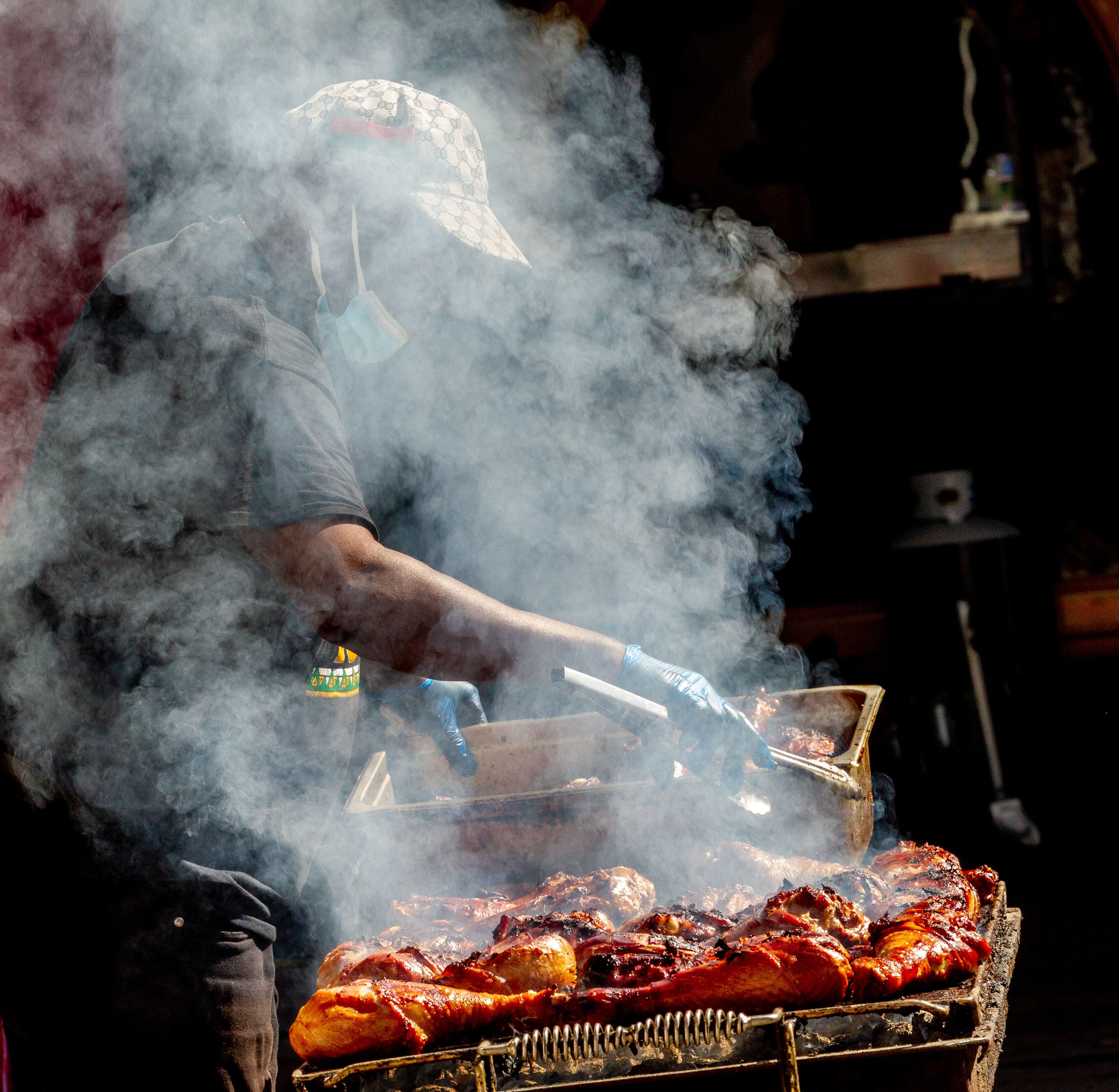 Godfrey Powell grills turkey legs during the Sweet Auburn Music Festival in Atlanta on Sunday, September 26, 2021.The event was canceled last year because of the pandemic but returned this fall for family fun, good food and music. (Photo: Steve Schaefer for The Atlanta Journal-Constitution)