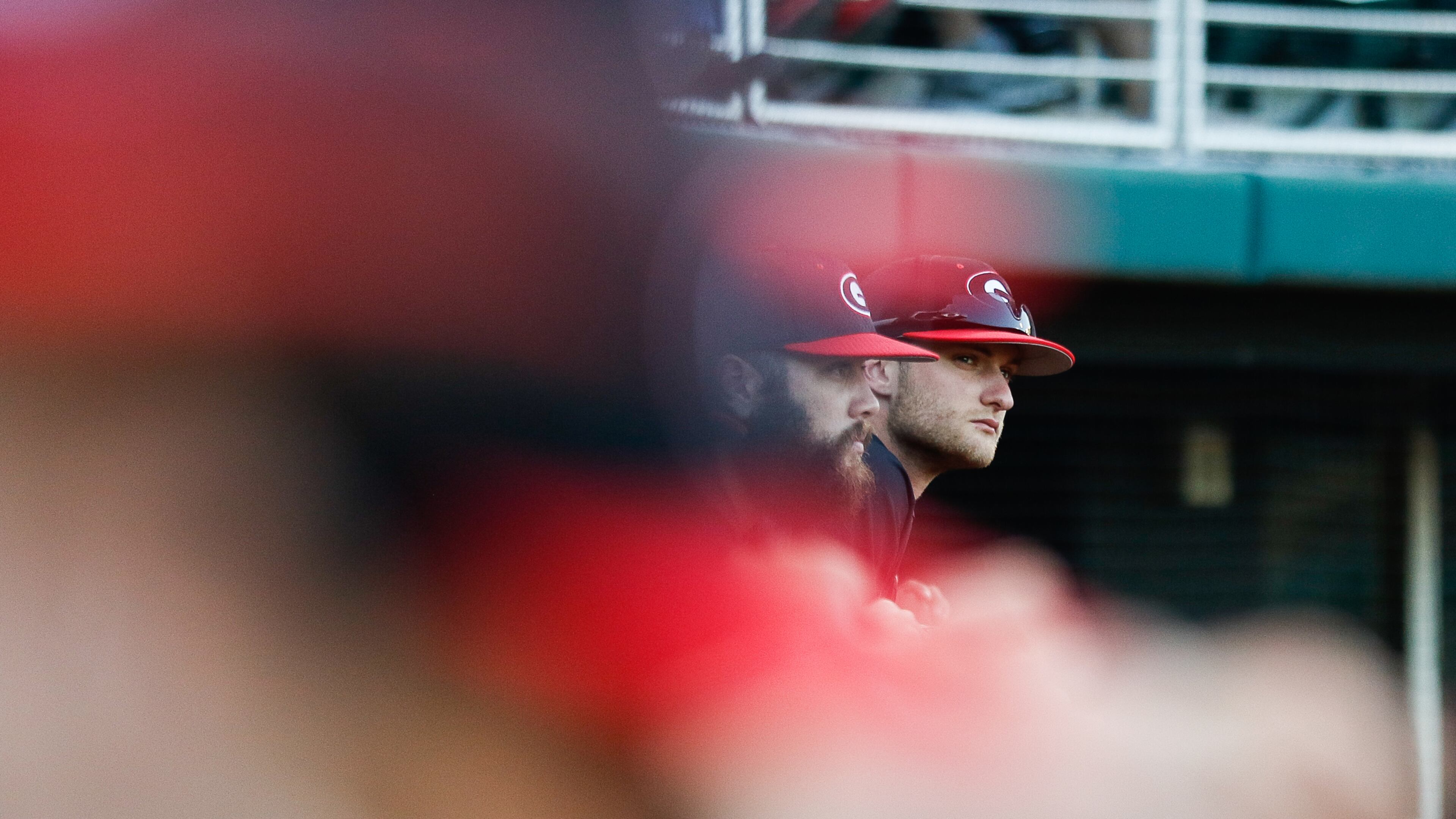 Georgia outfielder C.J. Smith (right) looks over the field as the Bulldogs face Vanderbilt Friday, April 5, 2019, at Foley Field in Athens.