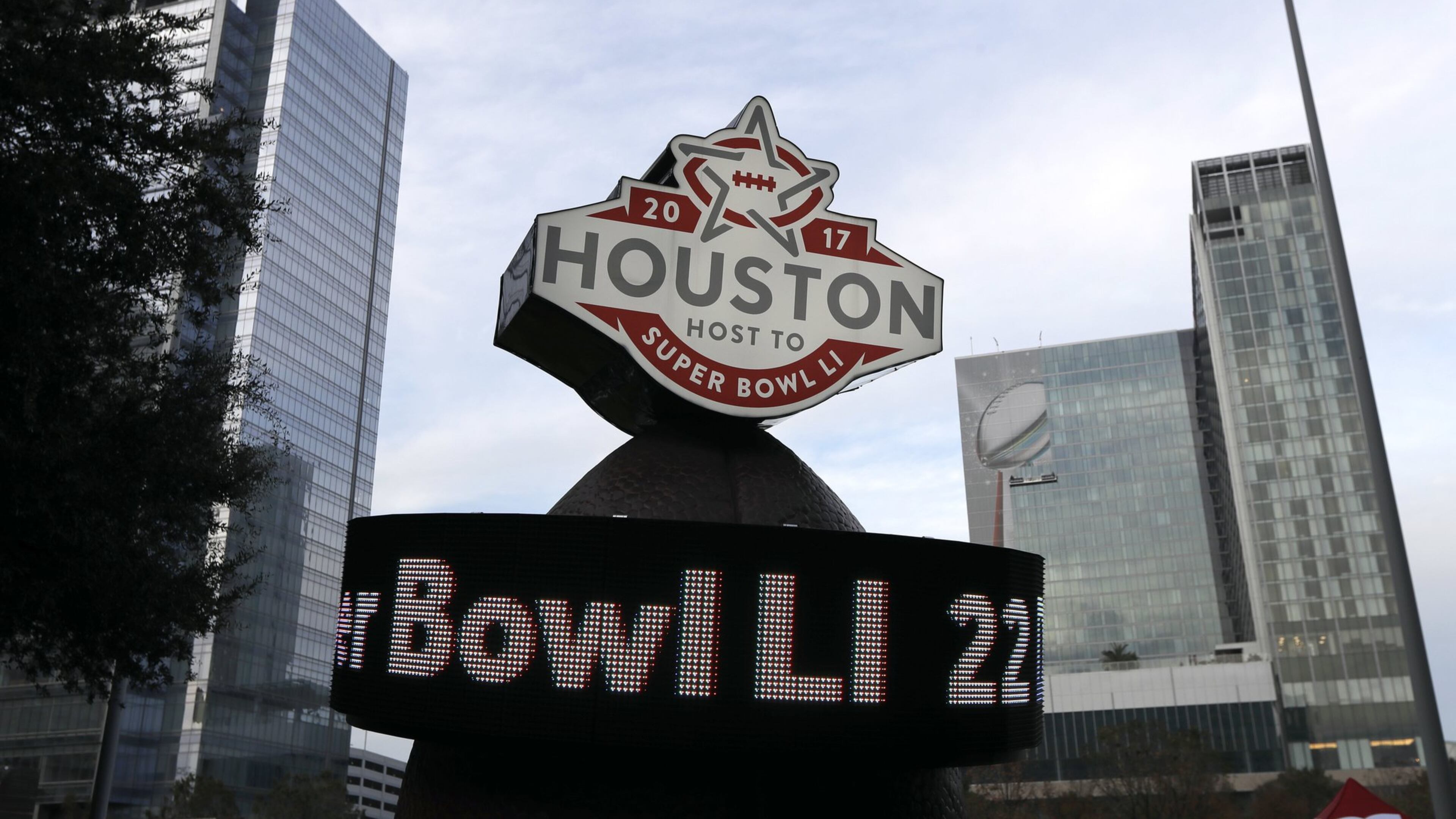 This Jan. 14, 2017 photo shows a countdown sign leading up to Super Bowl LI in Discovery Green park in downtown Houston. Super Bowl LI will be played Feb. 5 at NRG Stadium in Houston. (AP Photo/David J. Phillip)