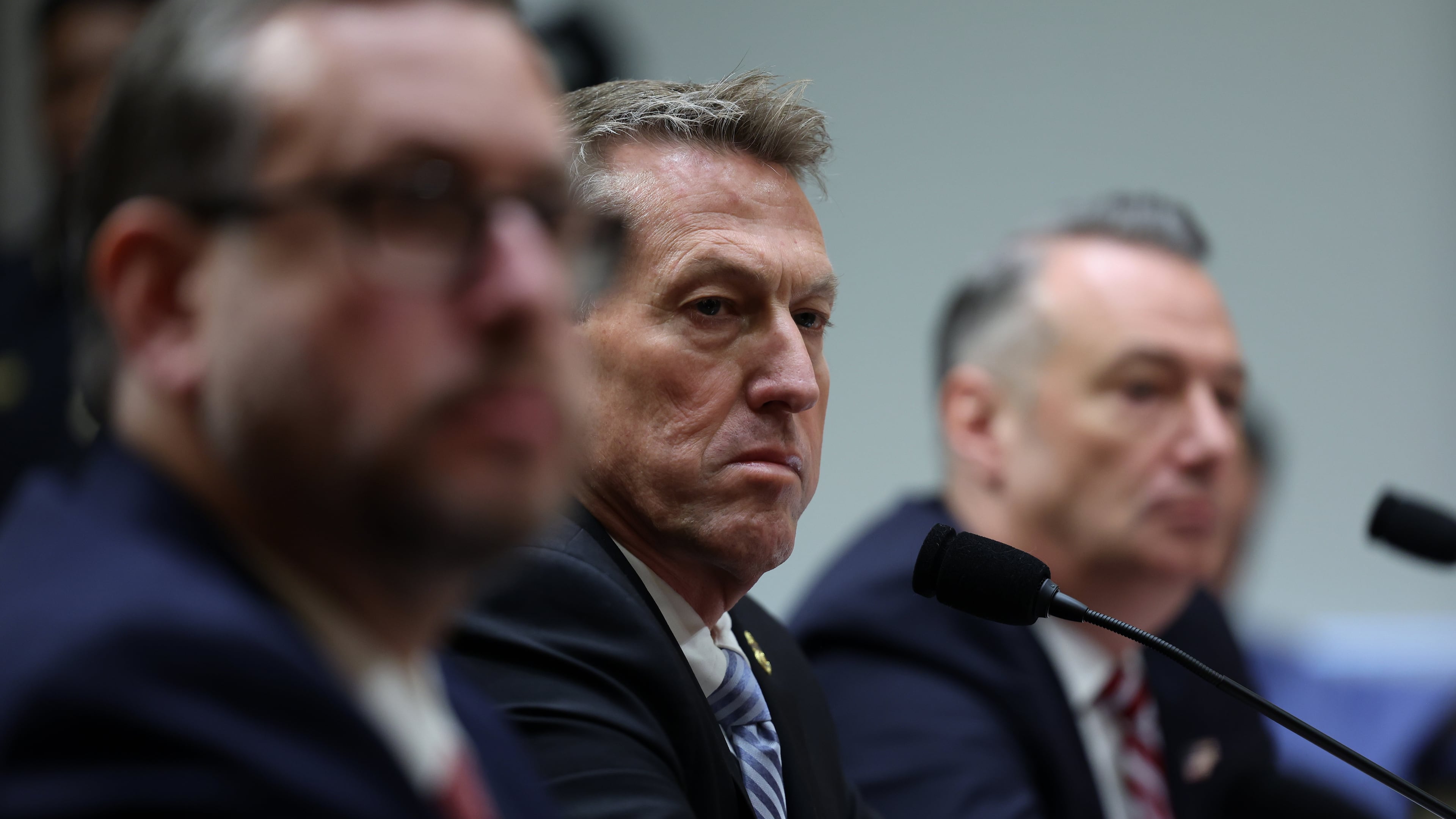 From left, Joseph Edlow, director of U.S. Citizenship and Immigration Services, Rodney Scott, commissioner of the U.S. Customs and Border Protection and Todd Lyons, senior official performing the duties of the director at U.S. Immigration and Customs Enforcement, listen during a Senate Homeland Committee hearing on Capitol Hill in Washington, Thursday, Feb. 12, 2026, in Washington. (AP Photo/Tom Brenner)