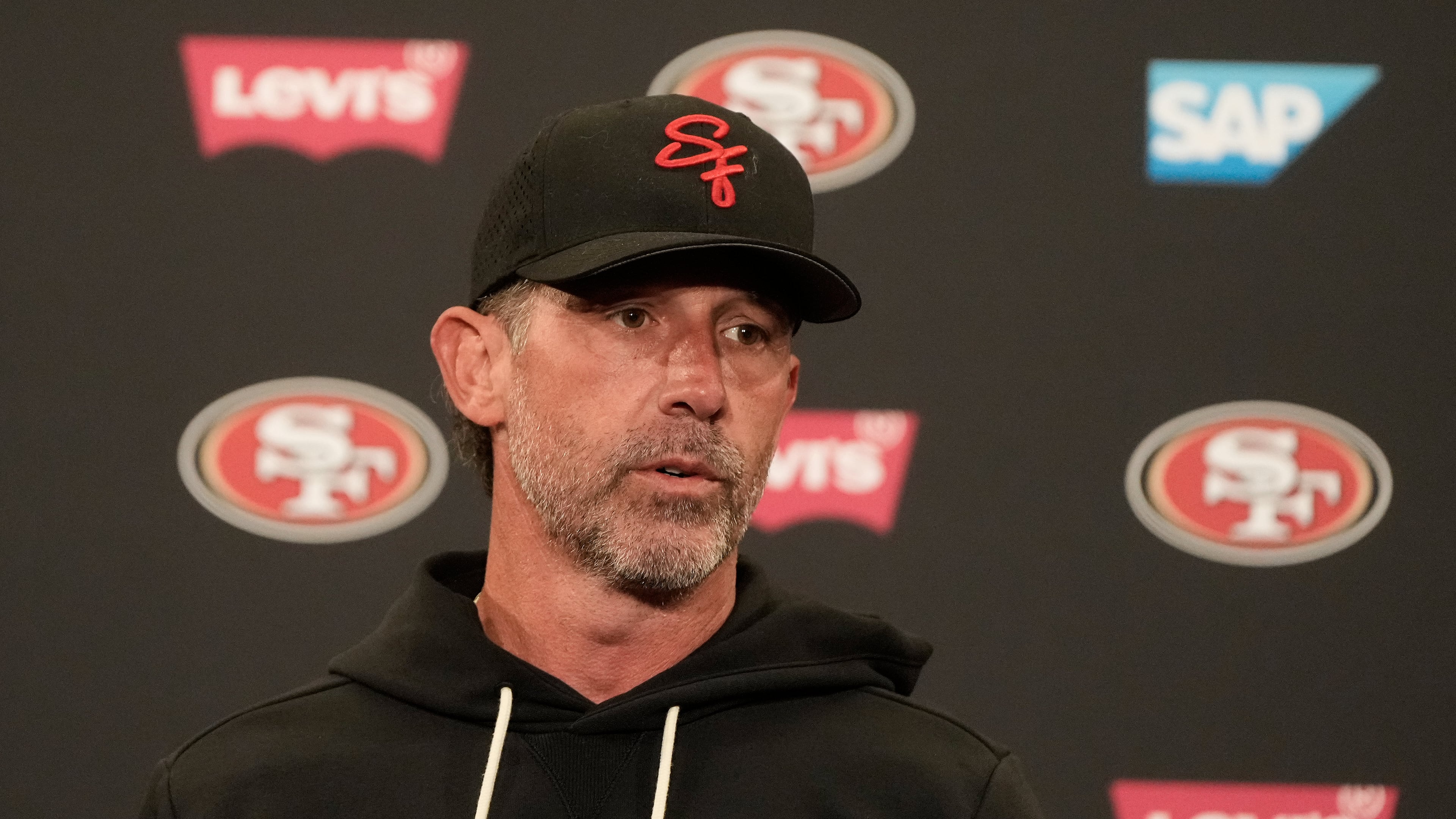 FILE - San Francisco 49ers head coach Kyle Shanahan speaks at a news conference after an NFL football practice Thursday, May 28, 2026, in Santa Clara, Calif. (AP Photo/Jeff Chiu, File)
