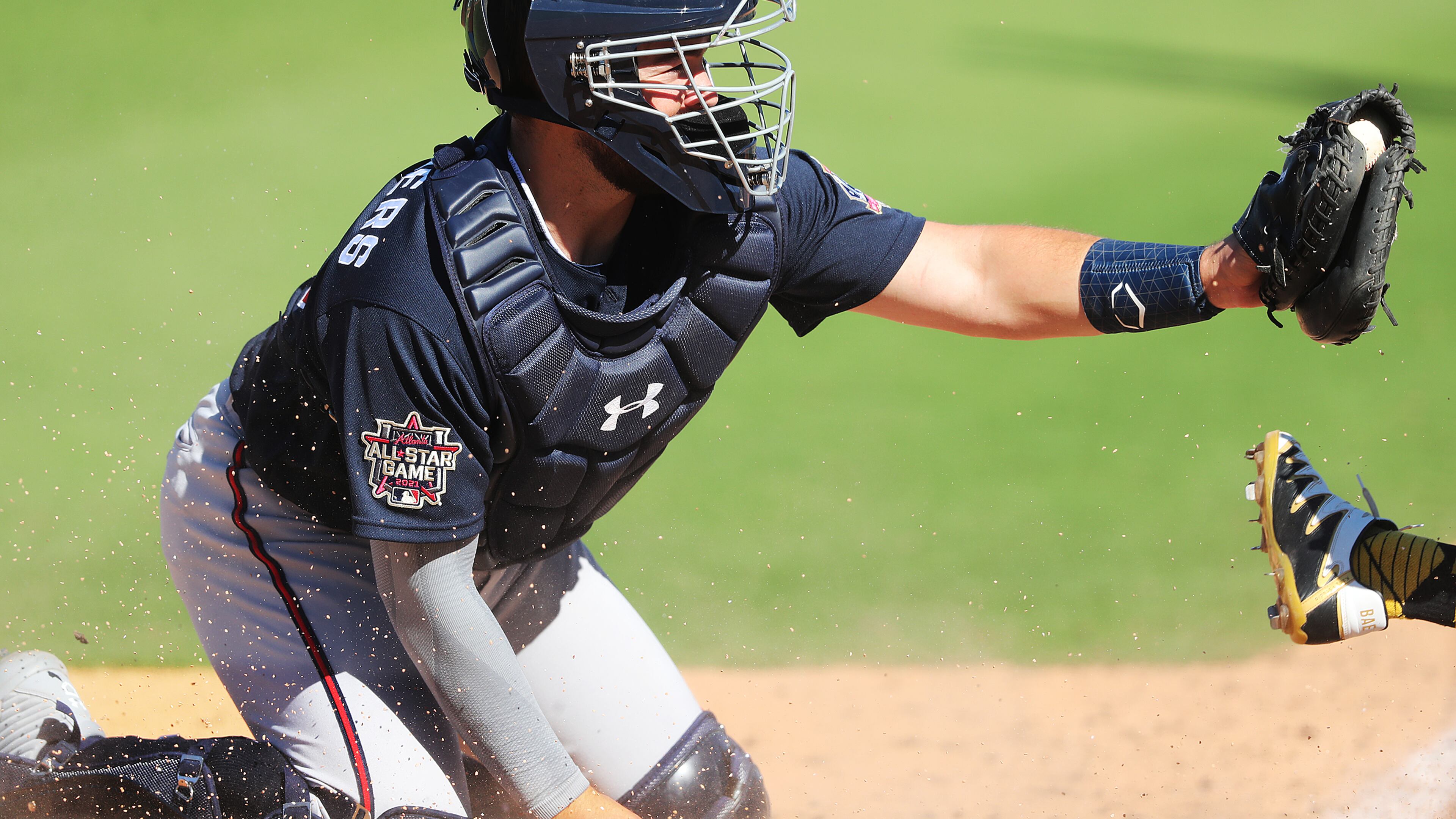 030421 Bradenton: Atlanta Braves catcher Shea Langeliers holds on to the ball making the tag on Pittsburgh Pirates Ji-hwan Bae at homeplate for the out during the sixth inning of a MLB spring training baseball game at LECOM Park on Thursday, March 4, 2021, in Bradenton. “Curtis Compton / Curtis.Compton@ajc.com”