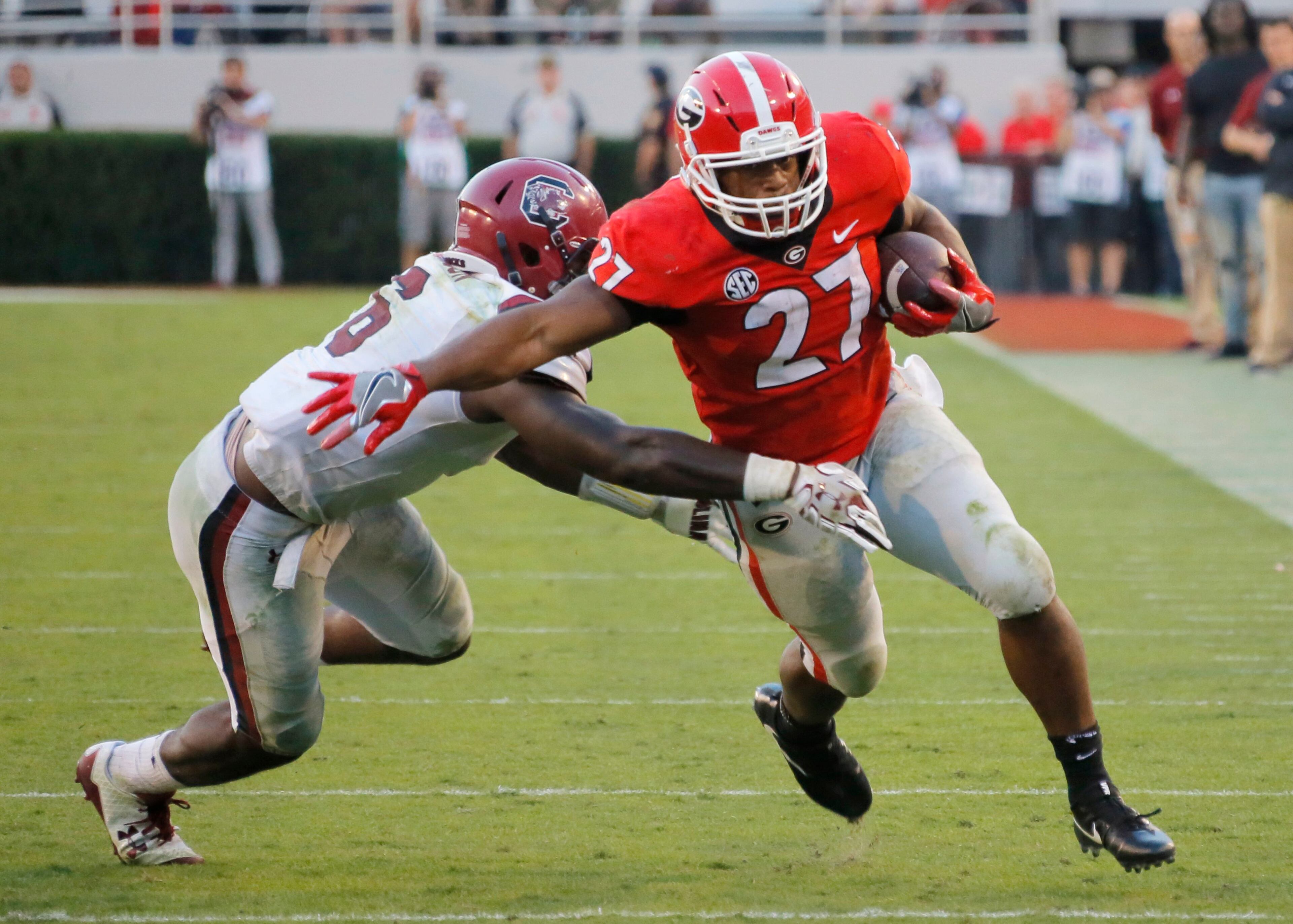 11/4/17 - Athens - Georgia Bulldogs running back Nick Chubb (27) runs for a first down to the five yard line to set up a UGA field goal. NCAA football game between the University of Georgia Bulldogs and the University of South Carolina Gamecocks BOB ANDRES /BANDRES@AJC.COM