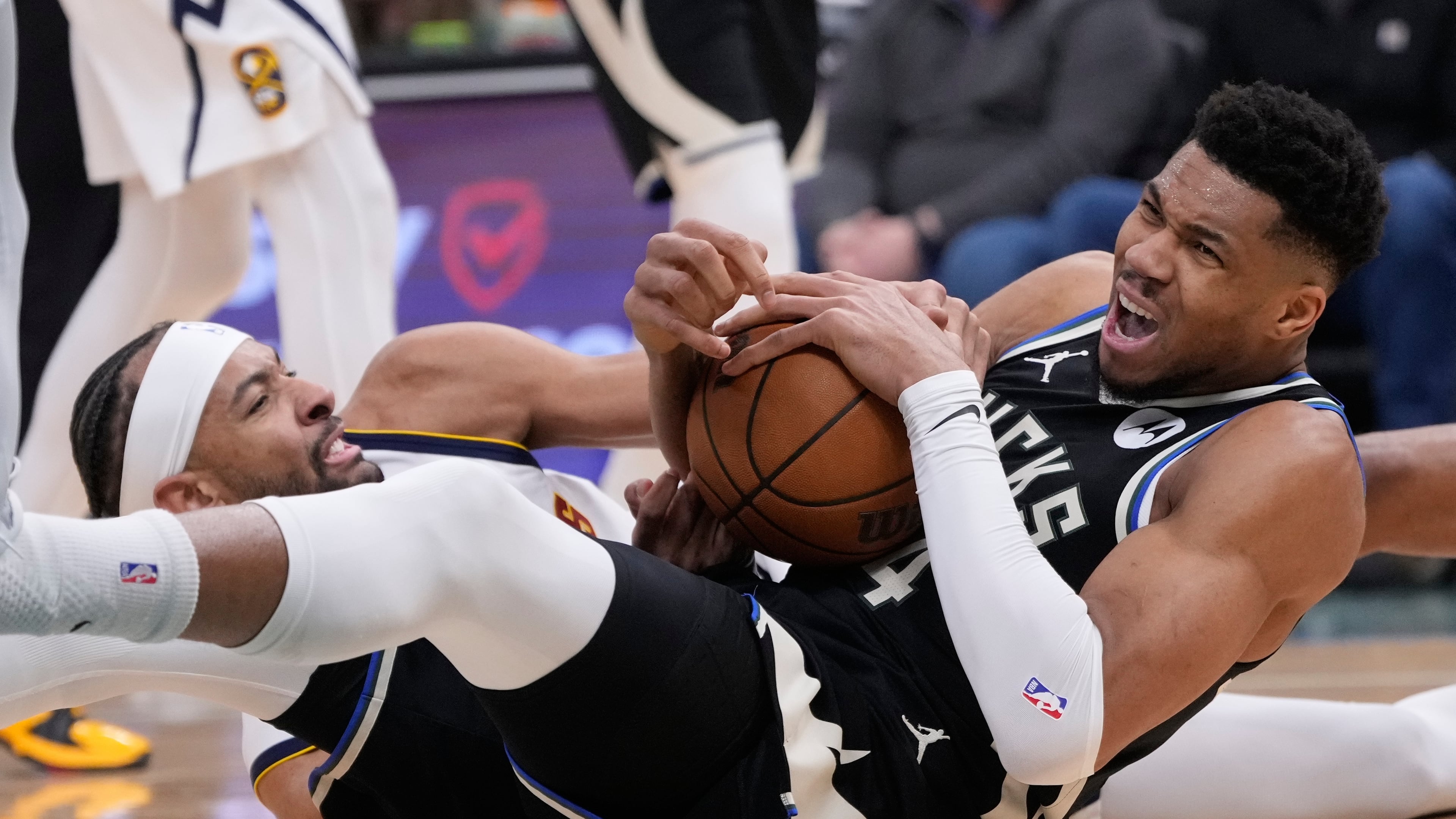 Milwaukee Bucks' Giannis Antetokounmposaid he expects to miss four to six weeks after he suffered a second injury to his right calf Friday night. (Morry Gash/AP)