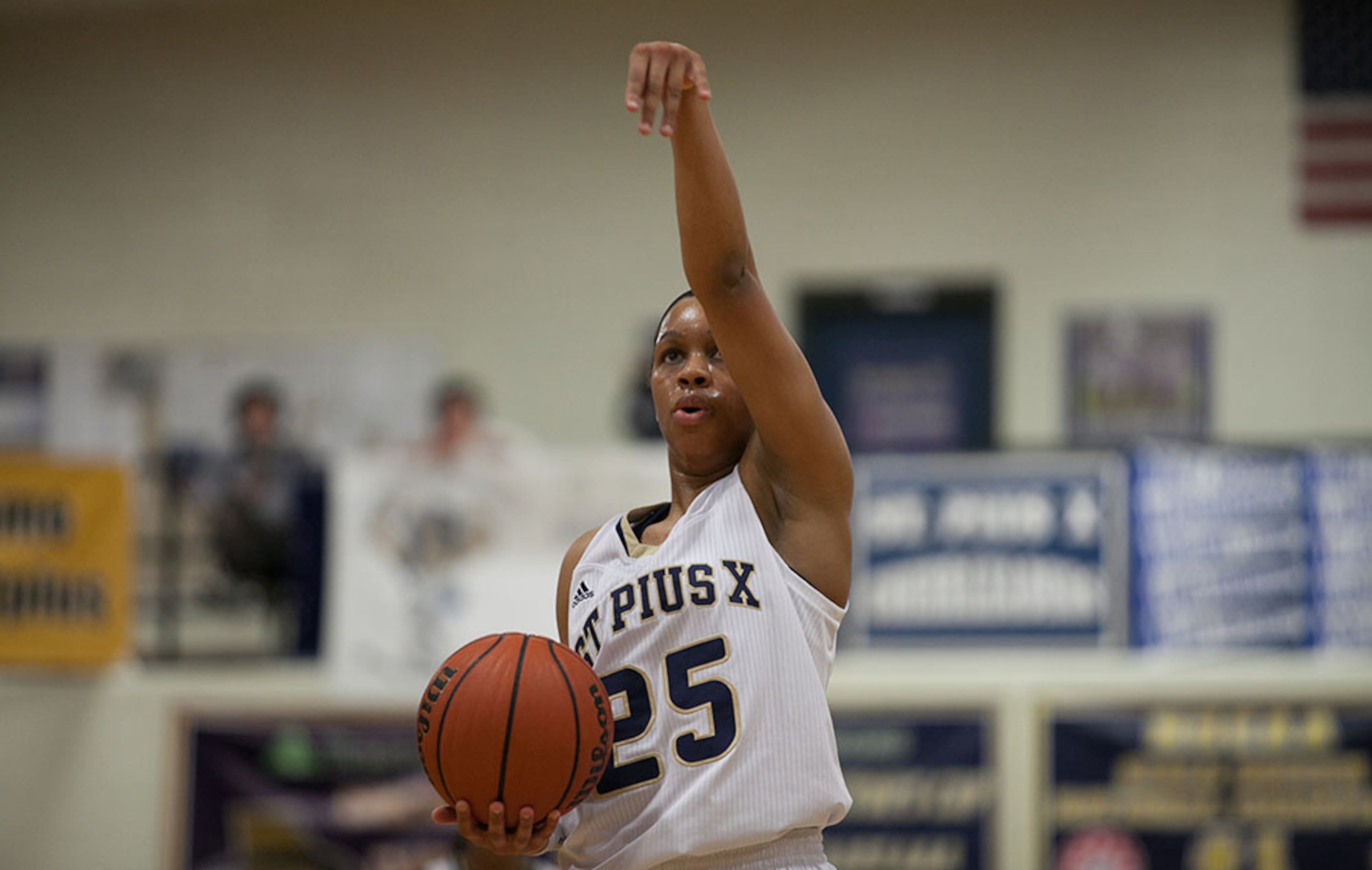 February 21, 2014 Atlanta- St. Pius player Asia Durr (25) signals before taking a shot from the free-throw line during a High School basketball game on Friday, Feb. 21, 2014, in Atlanta, Ga. St. Pius defeated North Oconee 52-49 in the first round of the high school state tournament. BRANDEN CAMP/SPECIAL St. Pius' Asia Durr follows through her shot before taking a free-throw from the foul line. (Branden Camp / Special to AJC)