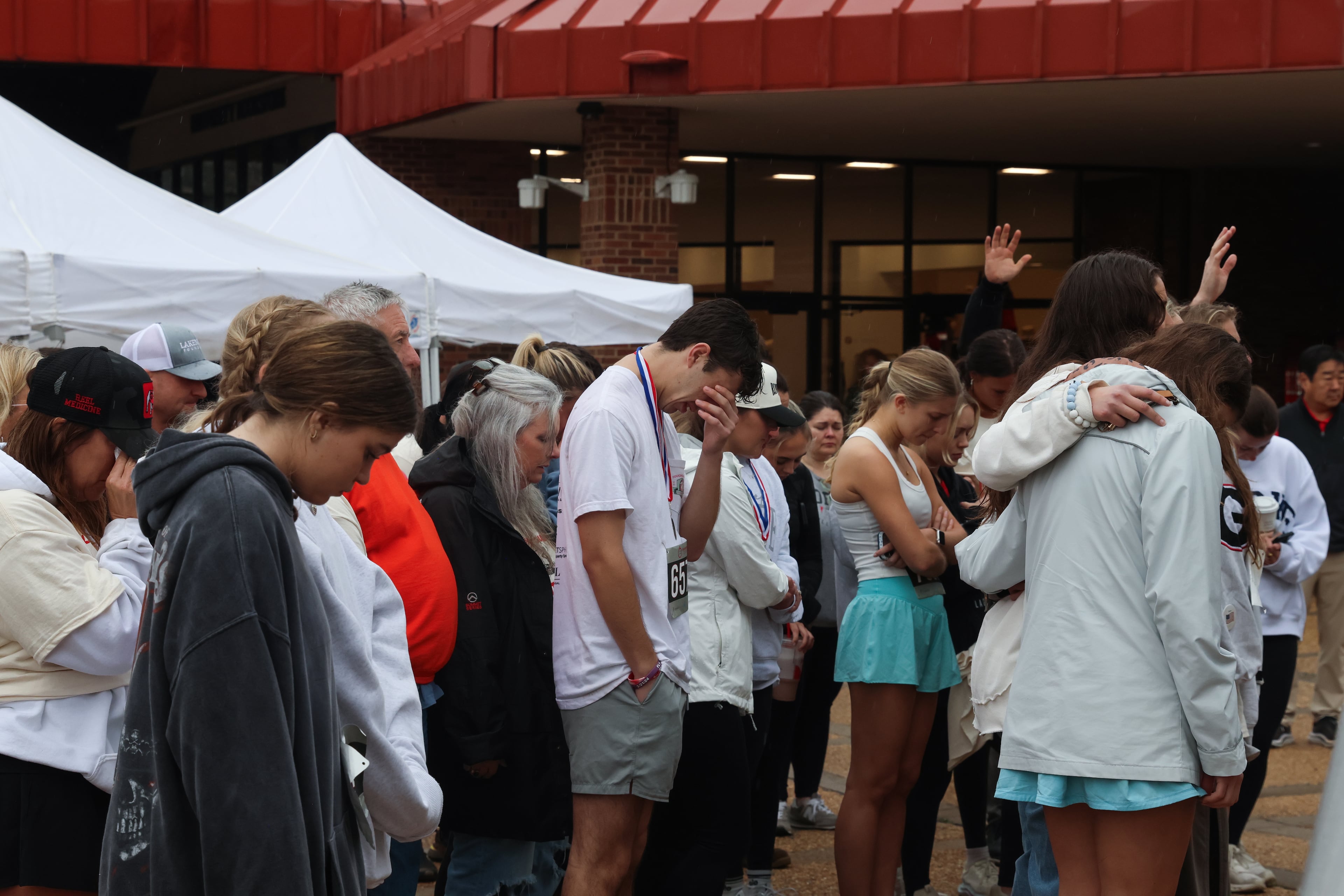 People gather at UGA’s Tate Plaza on Saturday, Feb. 21, 2026, for a memorial service for Augusta University nursing student Laken Riley. Riley was attacked on Feb. 22, 2024 while running in Oconee Forest Park on the UGA campus and killed. Riley had previously attended UGA. (C.J. Bartunek for the AJC)