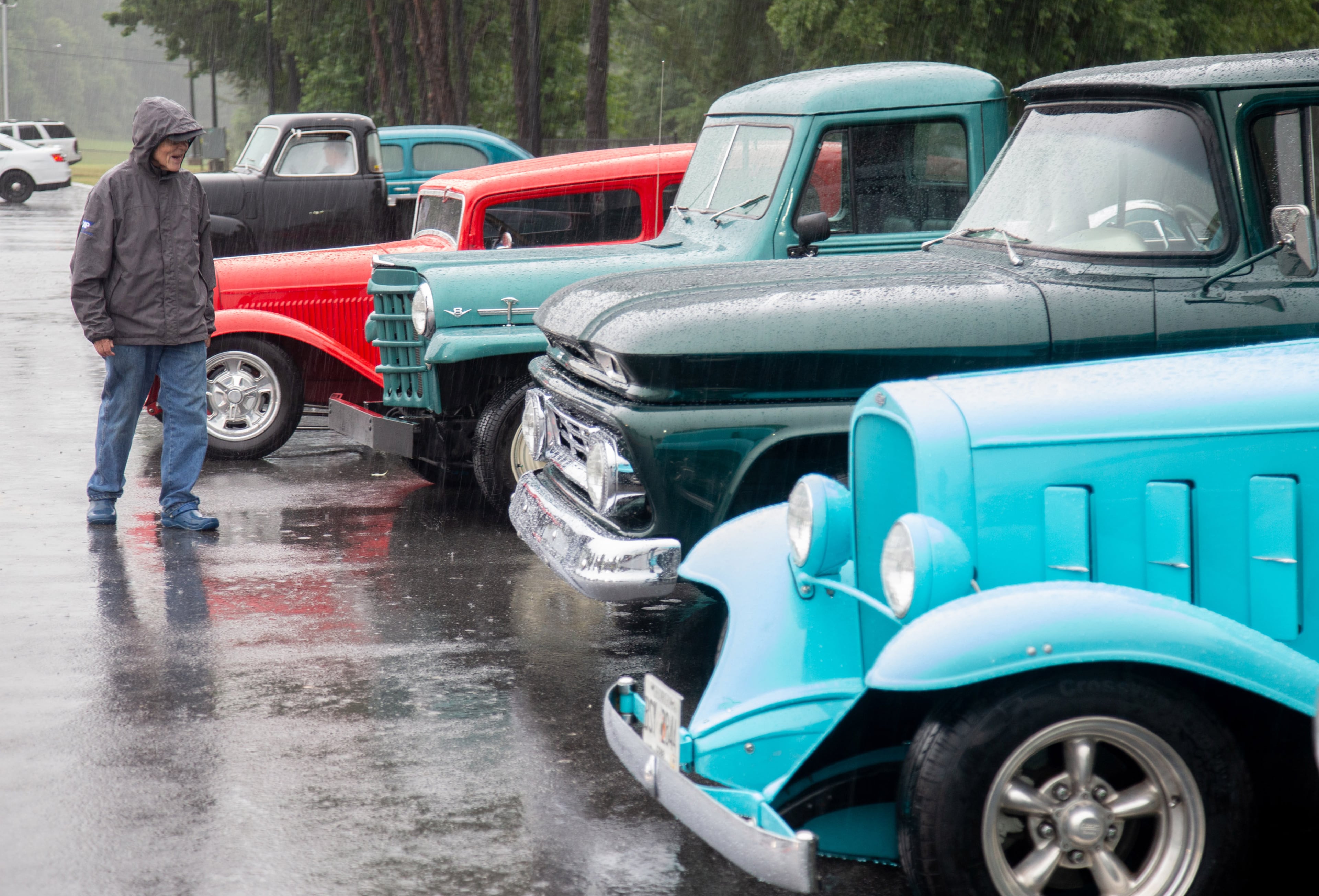 Ben Counter looks over some of the vintage cars during the Creepers Car Club’s 29th annual charity show in Marietta on Sunday, June 8, 2019. STEVE SCHAEFER / SPECIAL TO THE AJC