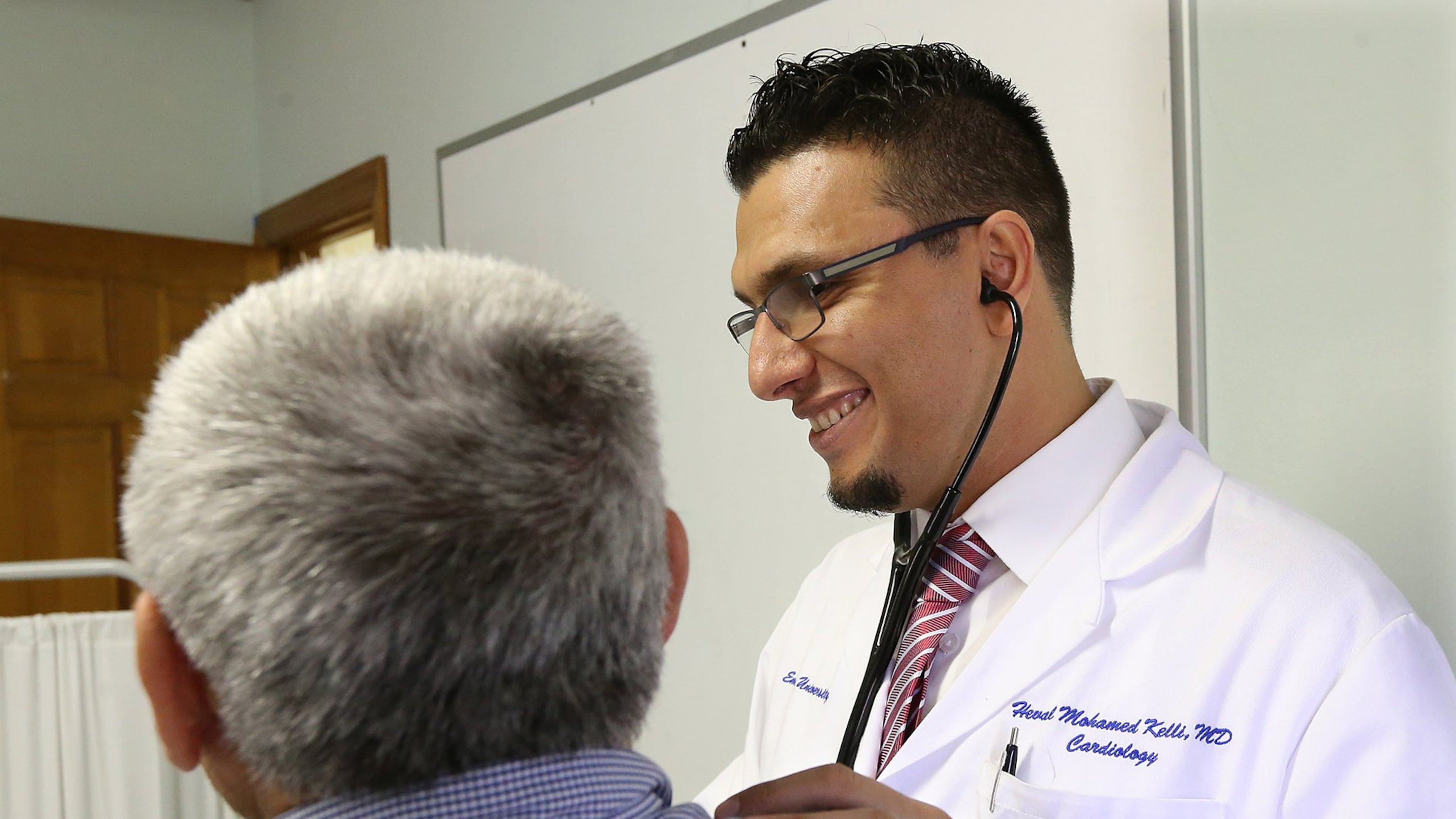 March 16, 2017, Clarkston: Dr. Heval Mohamed Kelli sees his patient Taha, a Syrian refugee, to check his health at the Clarkston Community Health Center on Thursday, March 16, 2017, in Clarkston. Curtis Compton/ccompton@ajc.com