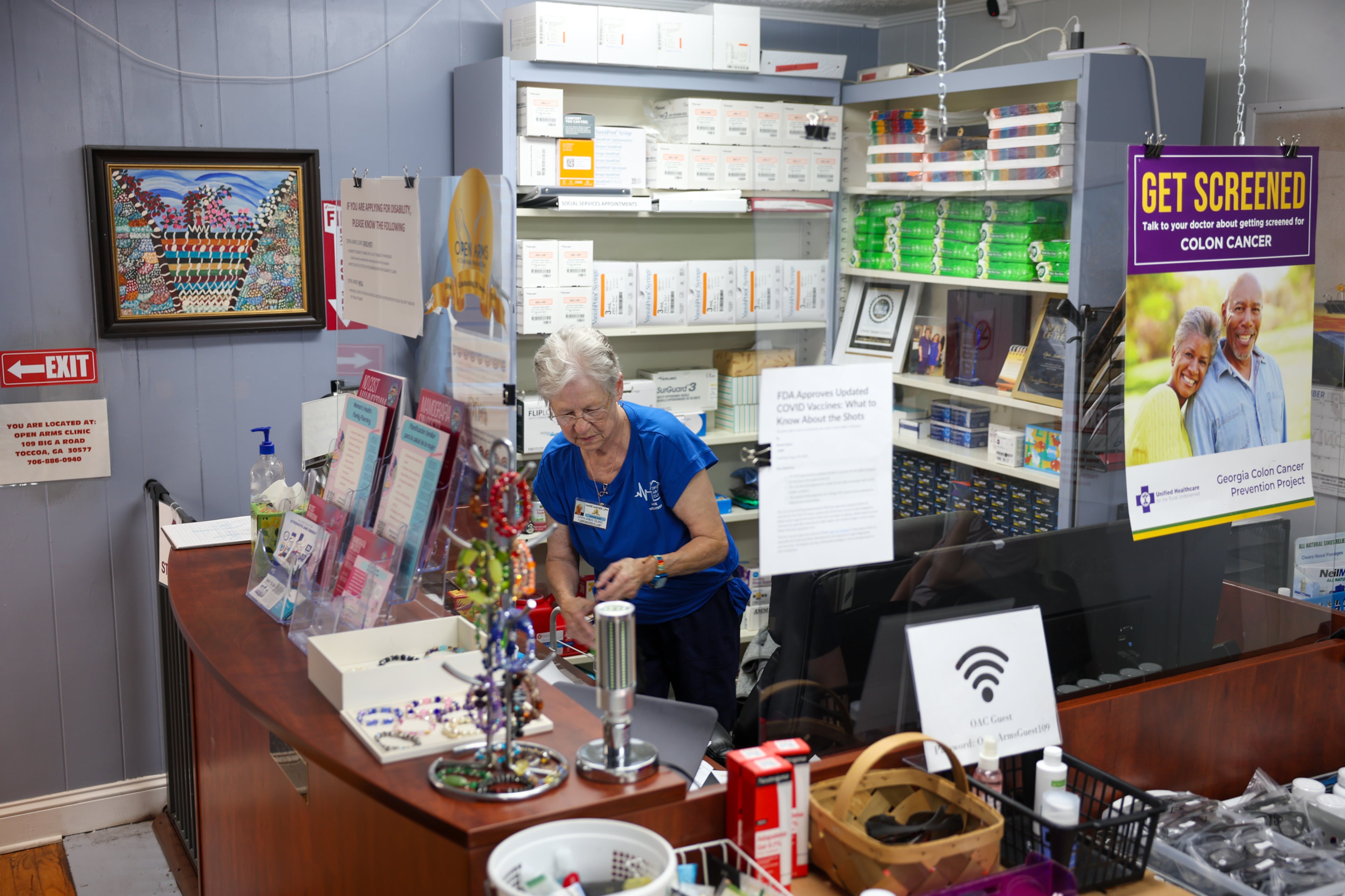 Staff nurse Marie Mayer works at Open Arms Clinic, a free clinic in Toccoa, on Sept. 29, 2026. The clinic provides free care to low-income residents who make less than $20,000 a year. Since COVID-era enhanced Obamacare subsidies expired late last year, the clinic's patient load has doubled. (Arvin Temkar/AJC)