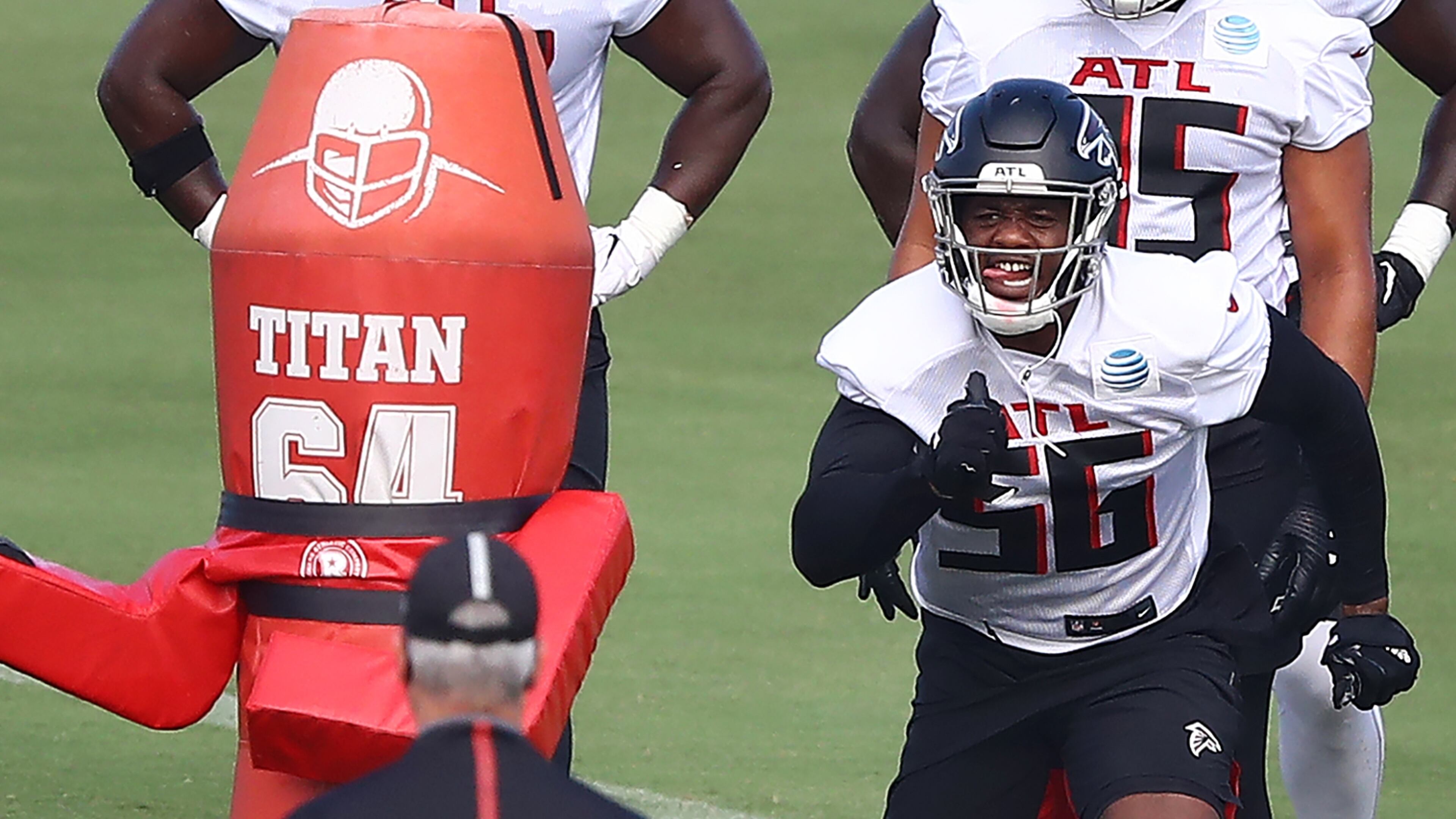 Falcons defensive end Dante Fowler (56) takes part in a drill during practice Wednesday, Aug. 19, 2020, in Flowery Branch.