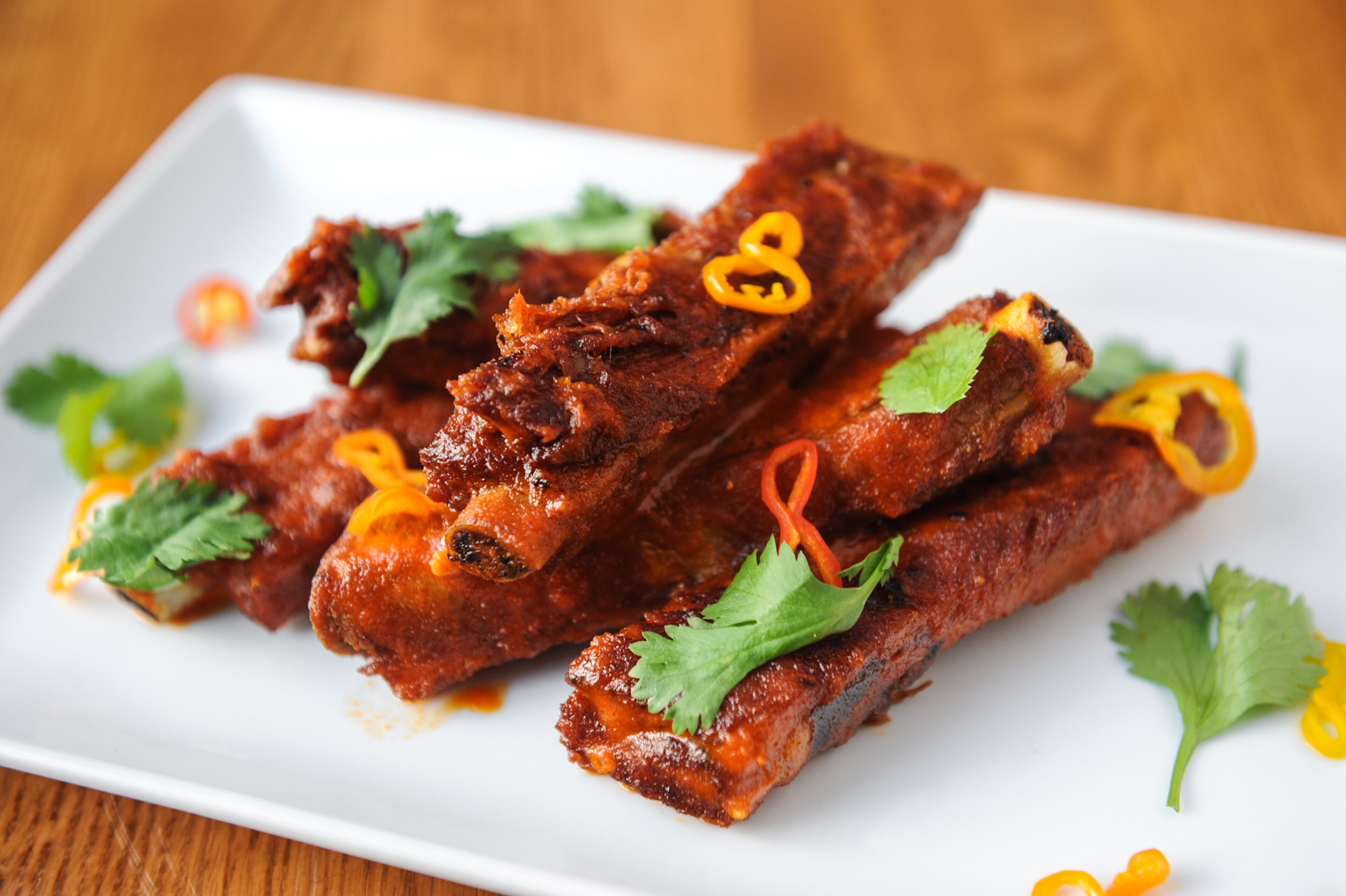 St. Louis Ribs with Sriracha butter and sweet pickled peppers at Torched Hop Brewing Co. in Atlanta. (Beckysteinphotography.com)