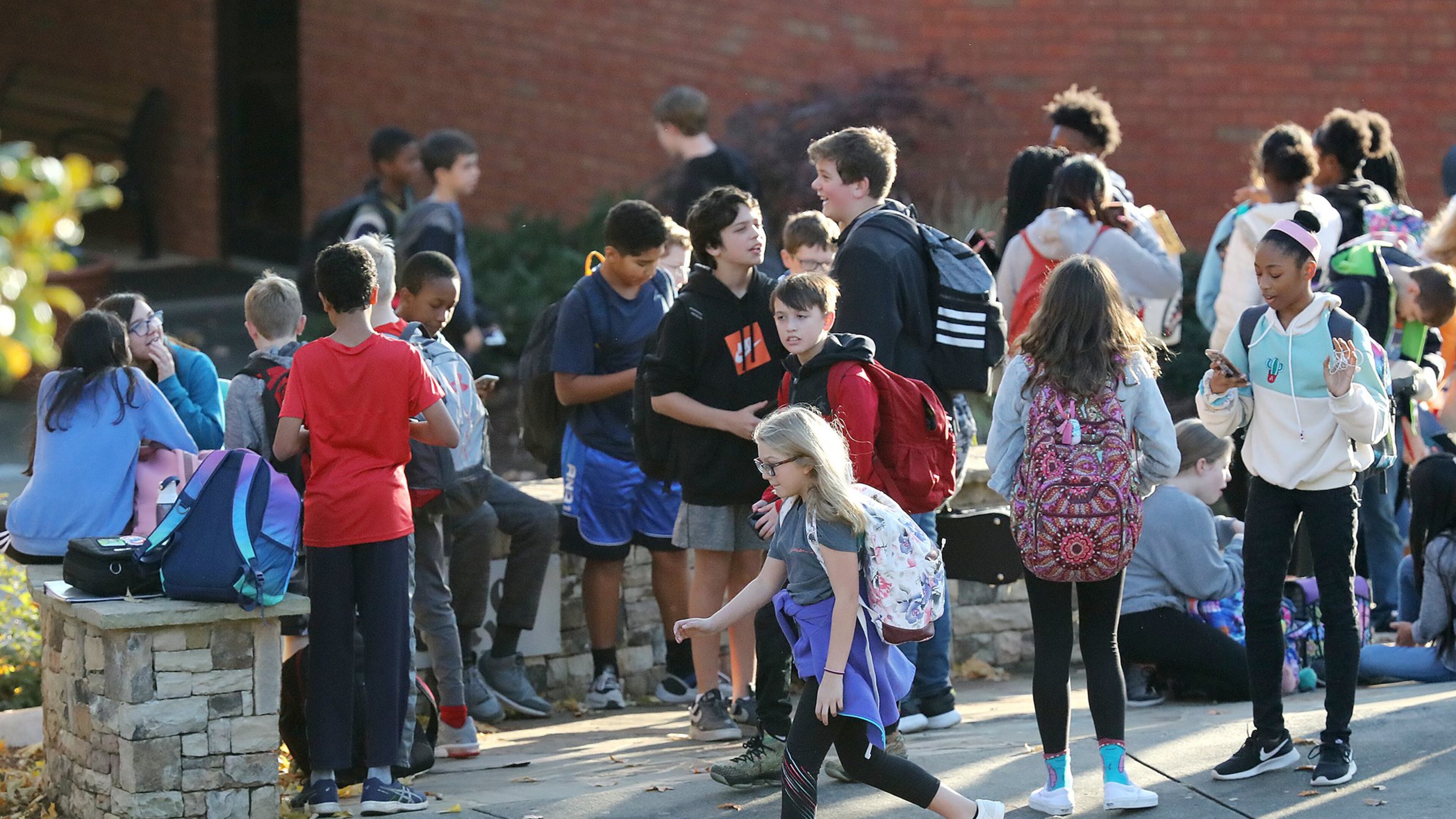In this file photo, school gets out at Mabry Middle School in Cobb County where an unvaccinated was diagnosed with measles. Curtis Compton/ccompton@ajc.com
