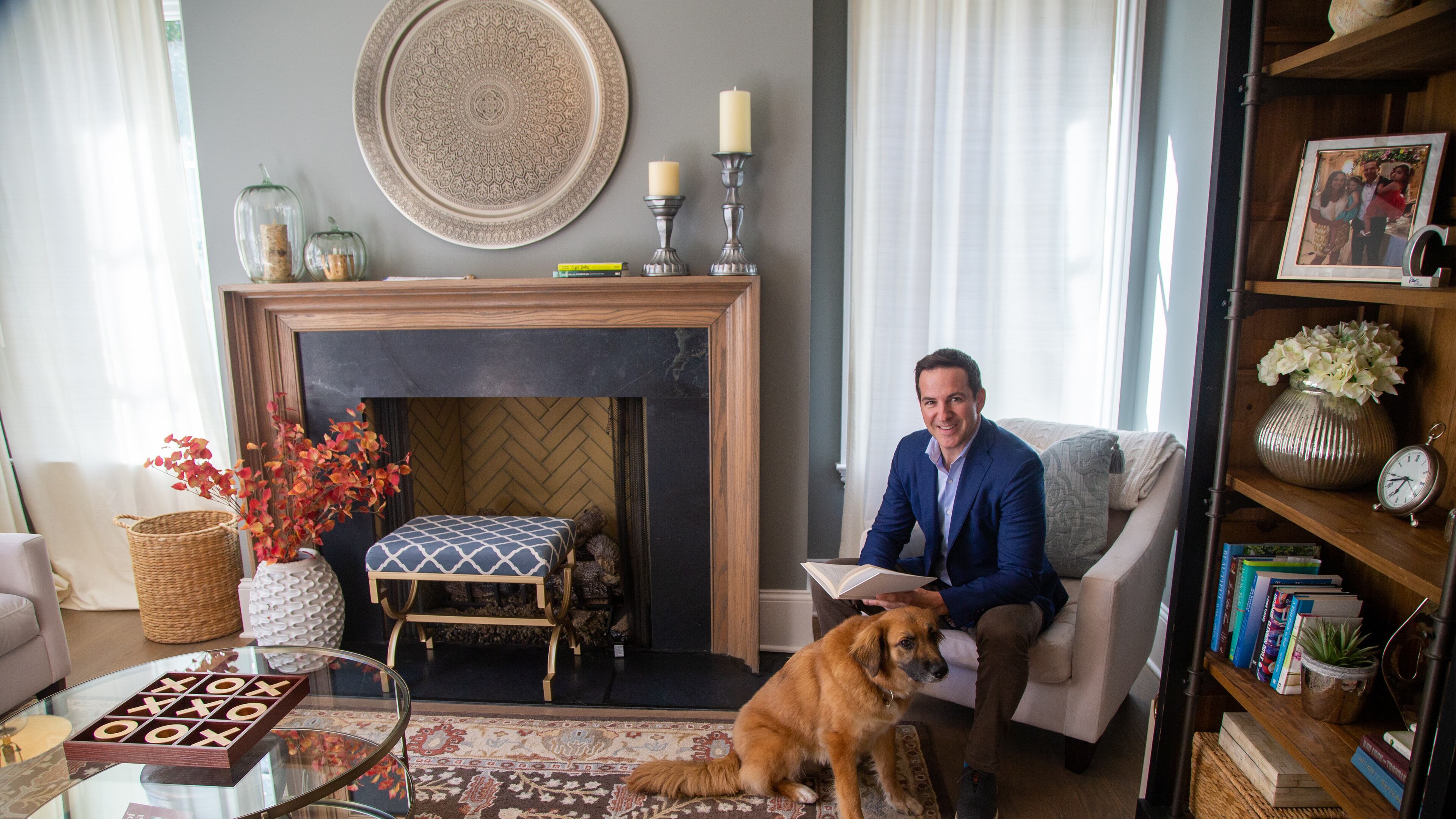 Ryan Cone reads in the study of his Brookhaven home. PHIL SKINNER FOR THE ATLANTA JOURNAL-CONSTITUTION.