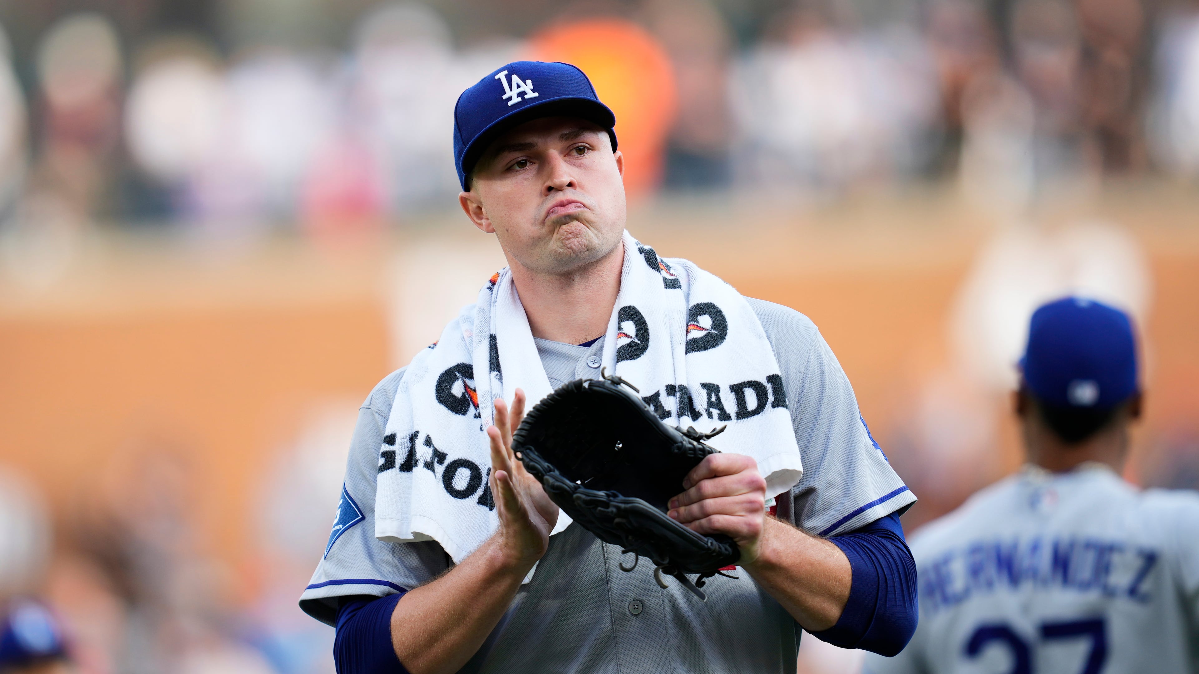 Los Angeles Dodgers pitcher Tarik Skubal claps as he walks to the dugout before the first inning of a baseball game against the Detroit Tigers Friday, Aug. 28, 2026, in Detroit. (AP Photo/Paul Sancya)