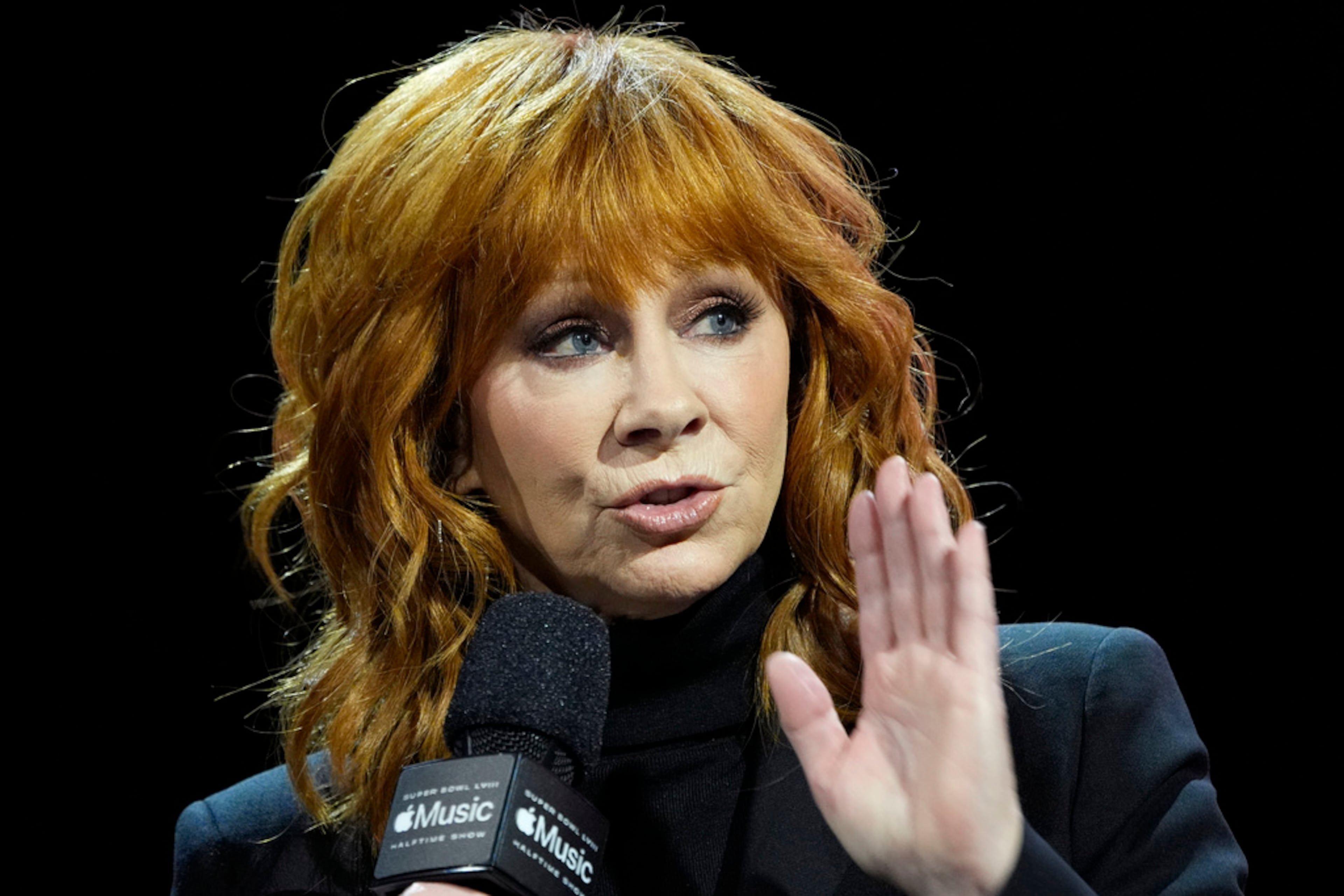 Reba McEntire speaks during a news conference ahead of the Super Bowl 58 NFL football game Thursday, Feb. 8, 2024, in Las Vegas. (AP Photo/John Locher)