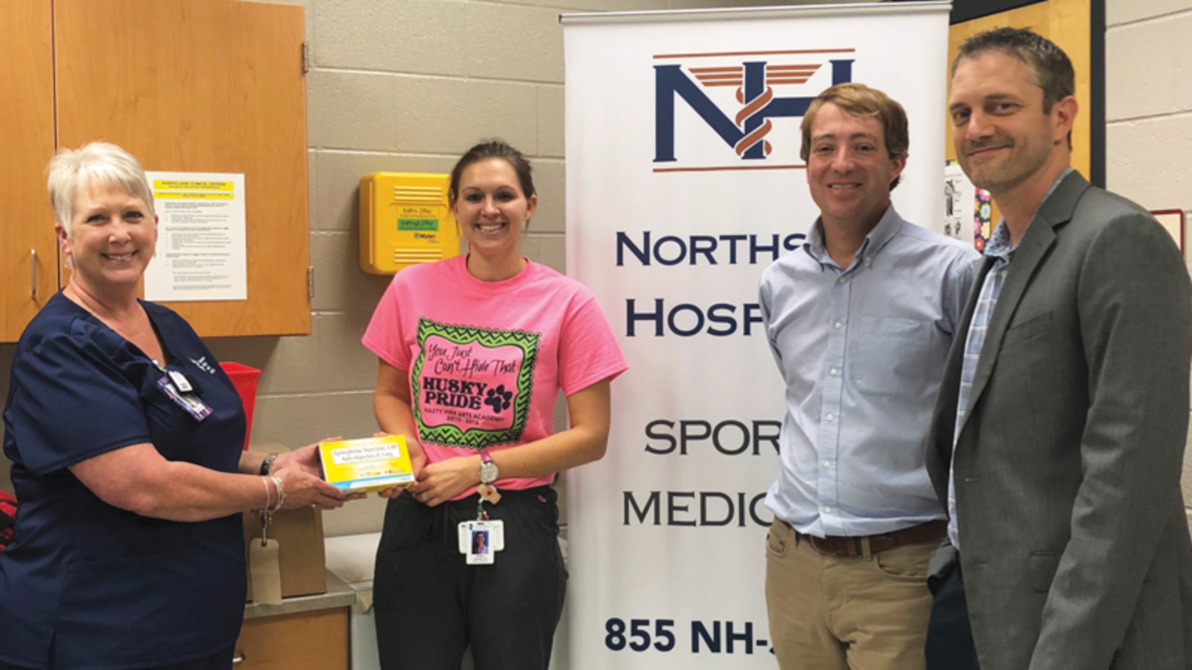Celebrating the delivery of EpiPens at Hasty Elementary School Fine Arts Academy in Canton are (from left) Cherokee County School District Lead Nurse Gwen Chambers, School Nurse Brittany Doucette, and Drs. Matthew Simmons and Stephen Rodes with the Northside Hospital Sports Medicine Network. CHEROKEE COUNTY SCHOOL DISTRICT