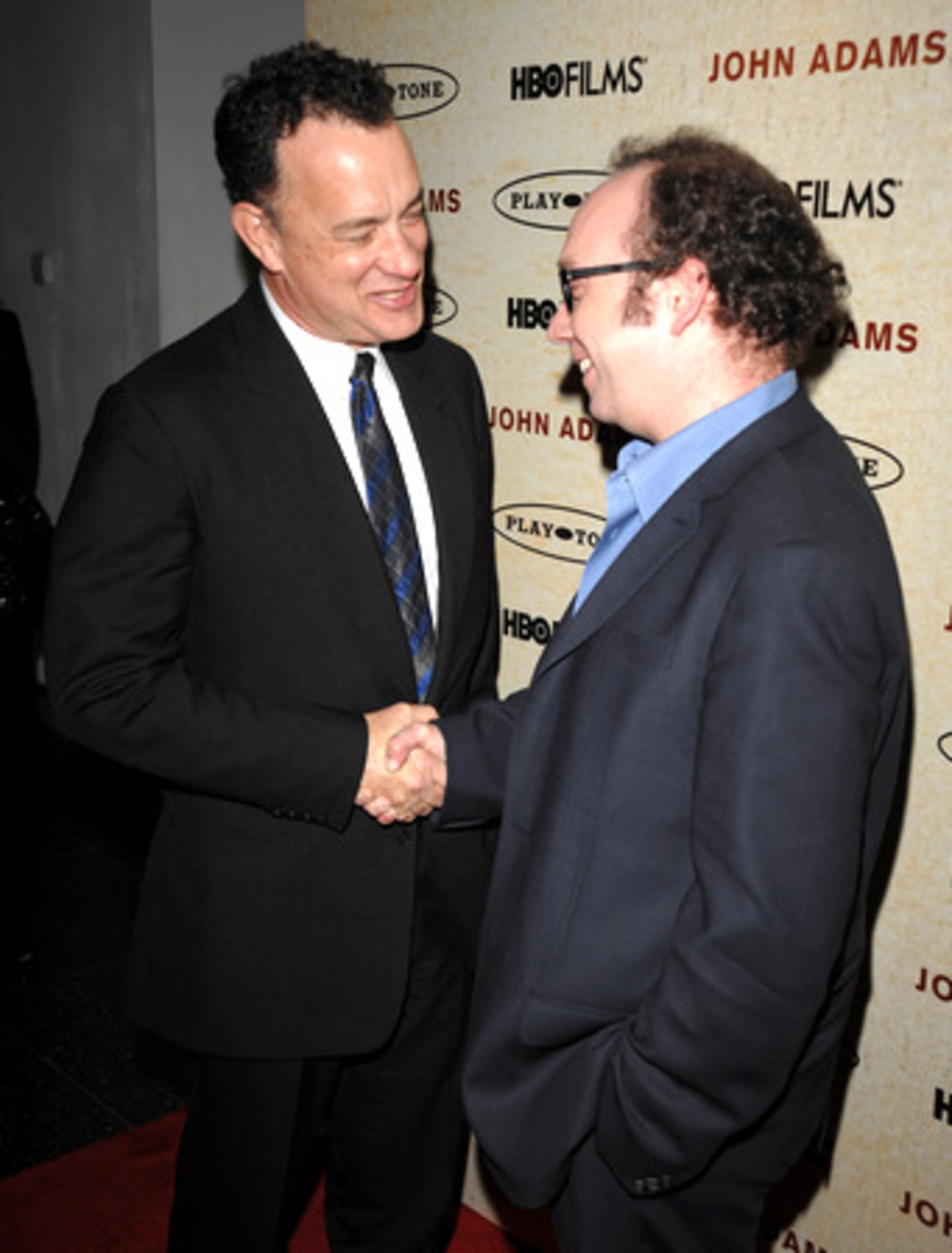 HBO invades public-TV territory with "John Adams," a seven-part miniseries about the founding father. It premiered at New York's Museum of Modern Art. Tom Hanks (left) produces; Paul Giamatti (right) stars.
