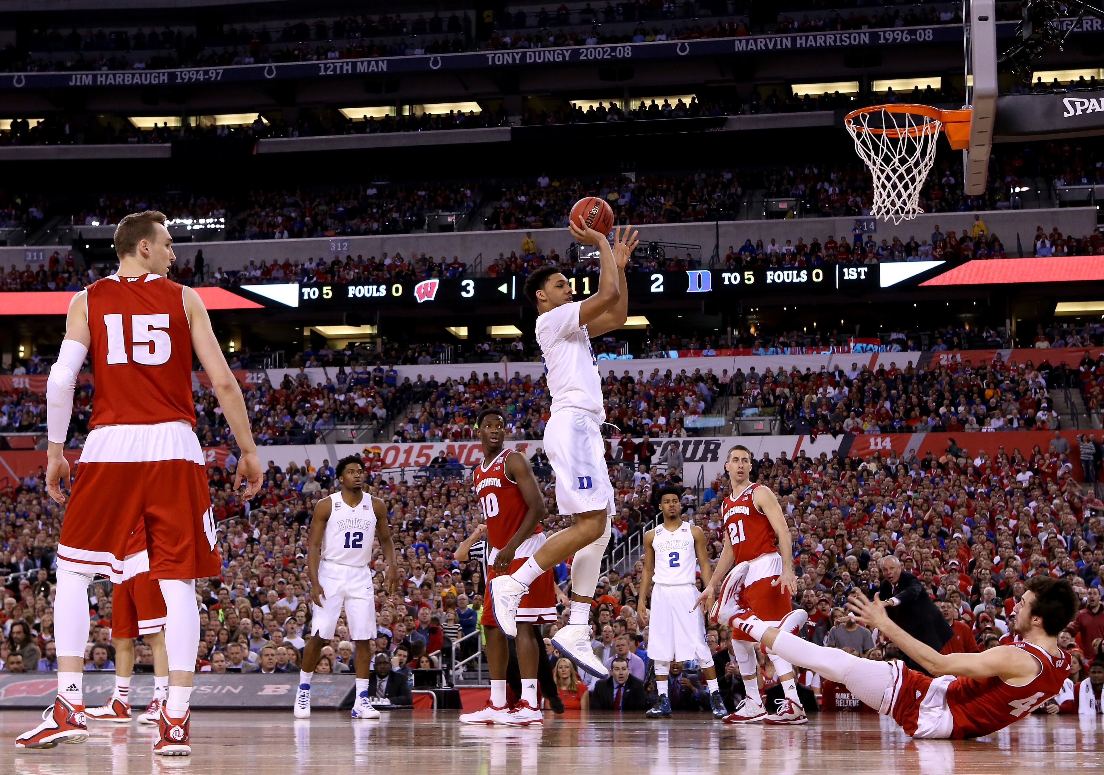 INDIANAPOLIS, IN - APRIL 06: Jahlil Okafor #15 of the Duke Blue Devils shoots against Frank Kaminsky #44 of the Wisconsin Badgers in the first half during the NCAA Men's Final Four National Championship at Lucas Oil Stadium on April 6, 2015 in Indianapolis, Indiana. (Photo by Streeter Lecka/Getty Images)