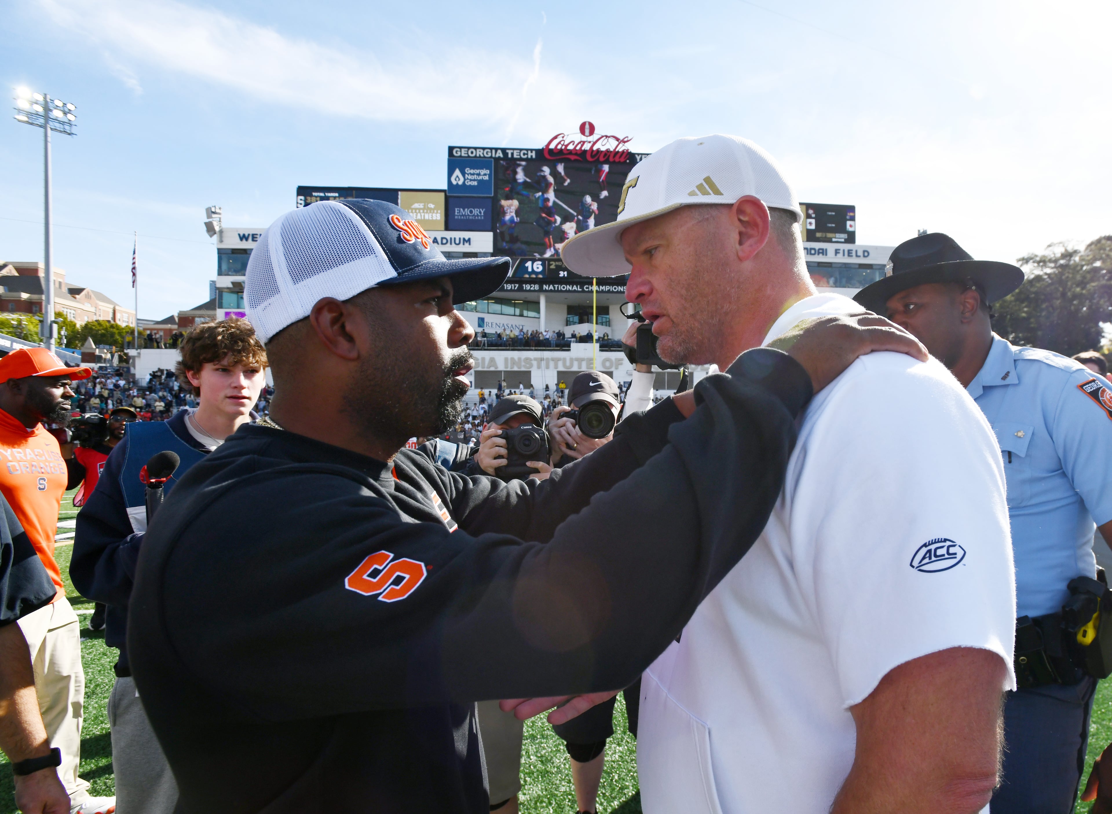Georgia Tech head coach Brent Key and Syracuse head coach Fran Brown shake hand after Georgia Tech beat Syracuse during an NCAA college football game at Bobby Dodd Stadium, Saturday, Oct. 25, 2025 in Atlanta. Georgia Tech won 41-16 over Syracuse. The Yellow Jackets are 8-0 for the first time since 1966 and 5-0 in the ACC for the first time ever. (Hyosub Shin/AJC)