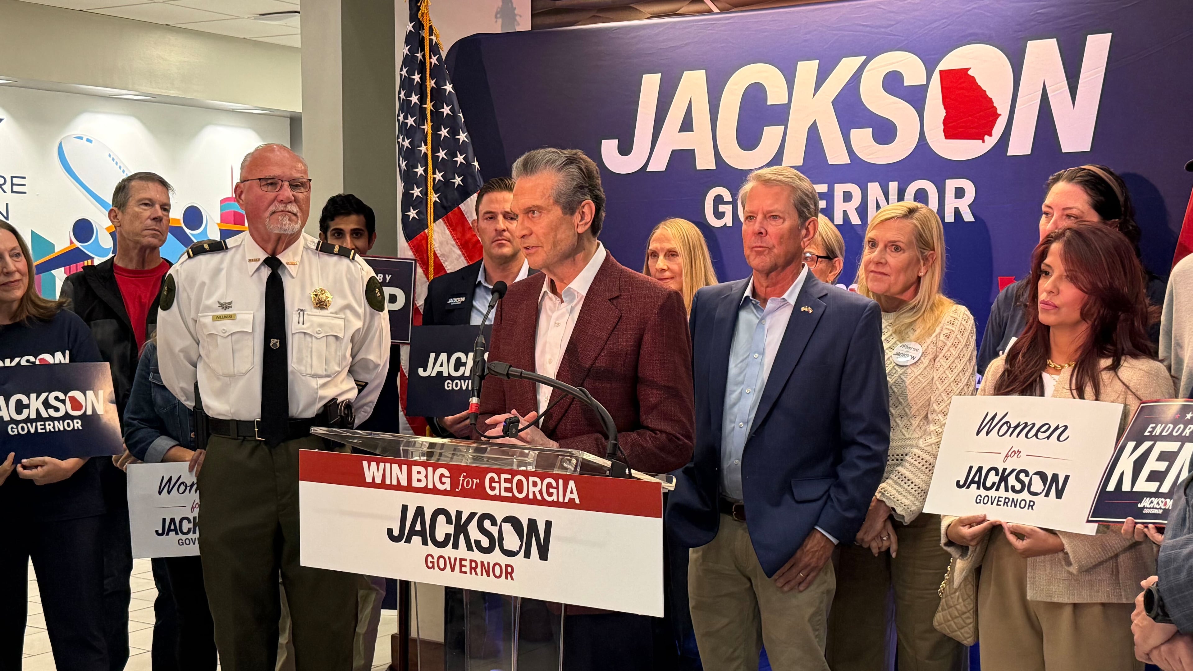 Gov. Brian Kemp and Republican nominee Rick Jackson kick off a daylong fly-a-round tour at Signature Aviation in Atlanta on Oct. 12, 2026. The two are urging Republicans to cast early ballots ahead of the start of the three-week early voting period on Tuesday. (Greg Bluestein/AJC)