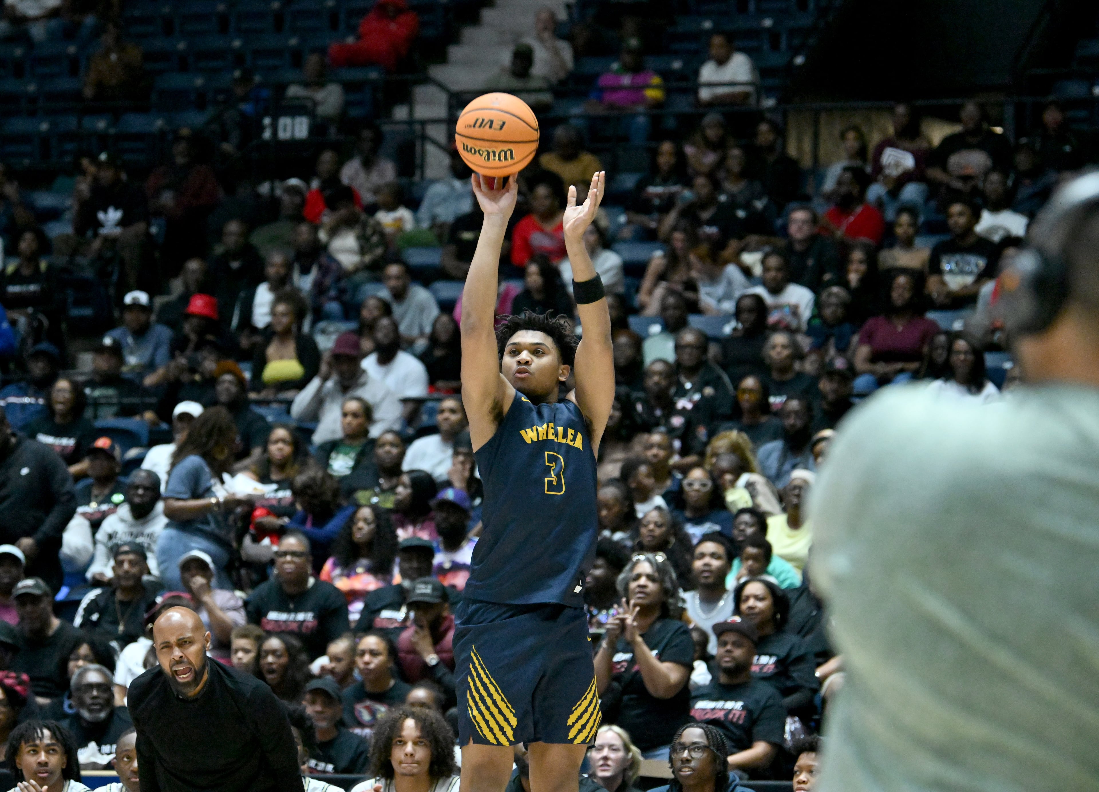 Wheeler Colben Landrew (3) gets off a shot during the first half in Class 6A Boys GHSA State Championship at the Macon Coliseum, Saturday, March 14, 2026, in Macon. Wheeler won 62-52 over Pebblebrook. (Hyosub Shin/AJC)