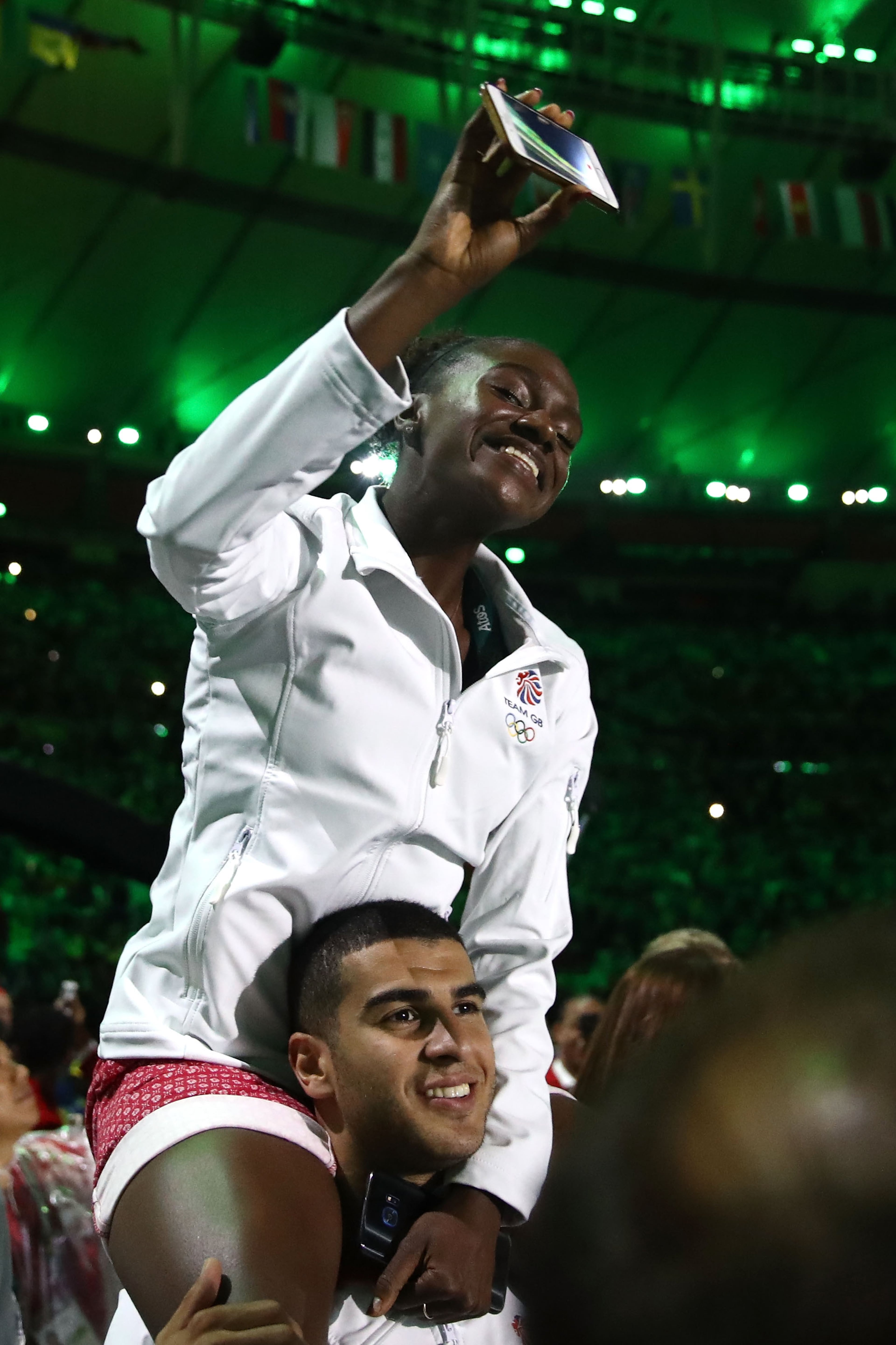 Members of Team Great Britain take part in the 'Heroes of the Games' segment during the Closing Ceremony on Day 16 of the Rio 2016 Olympic Games at Maracana Stadium on August 21, 2016 in Rio de Janeiro, Brazil. (Photo by Cameron Spencer/Getty Images)